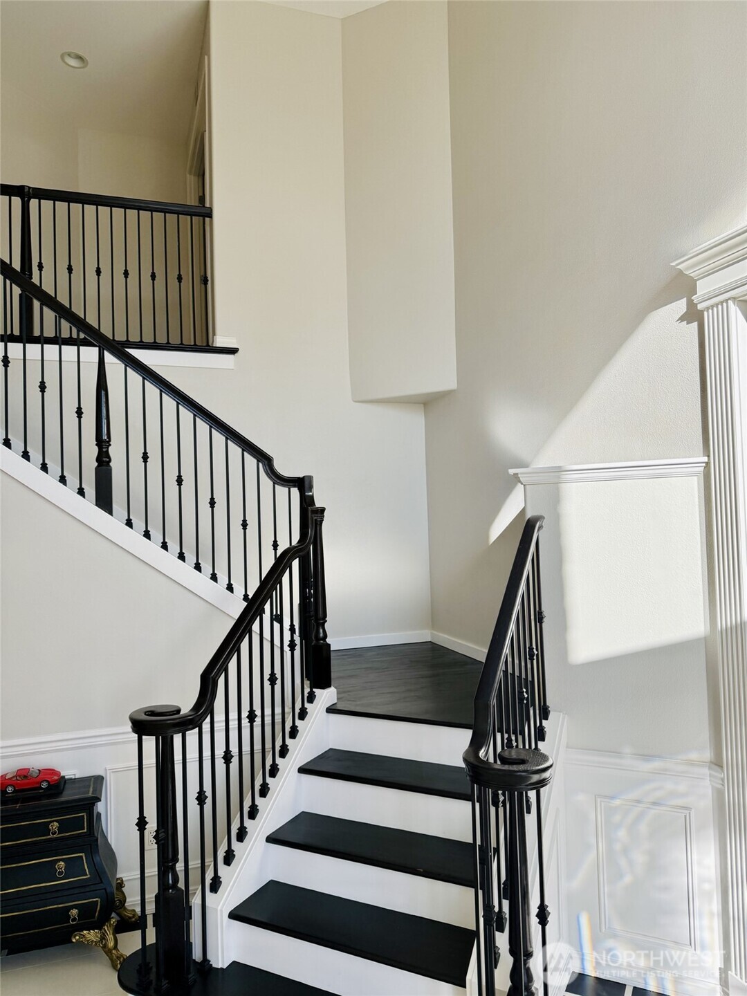 Grand staircase off entry.