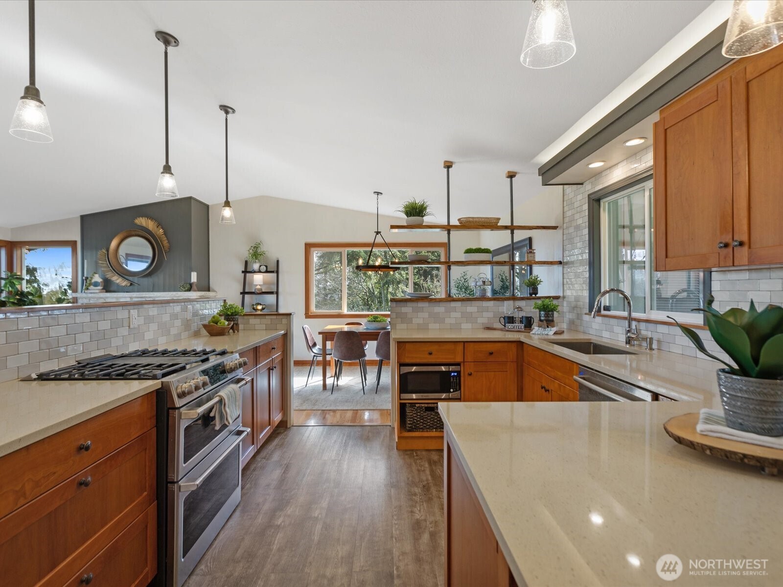 Updated kitchen with quartz countertops.