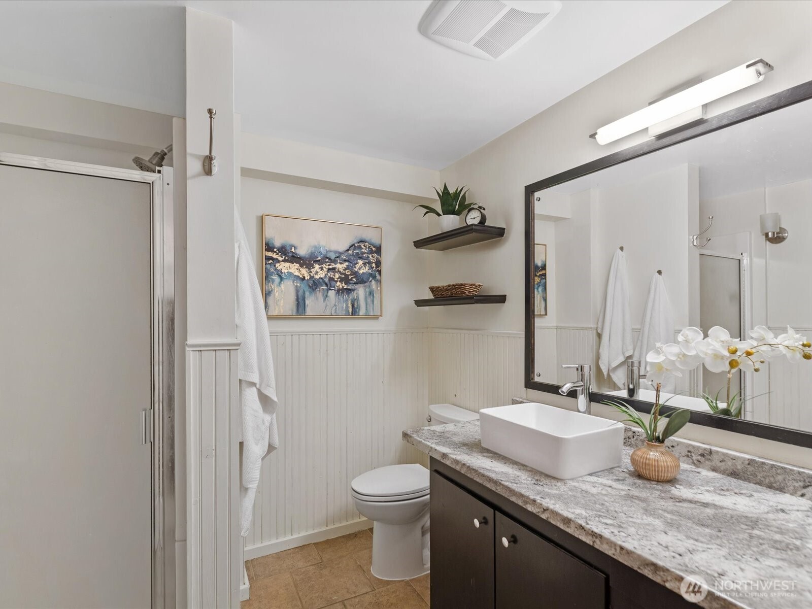 Downstairs 3/4 bathroom is nicely updated.