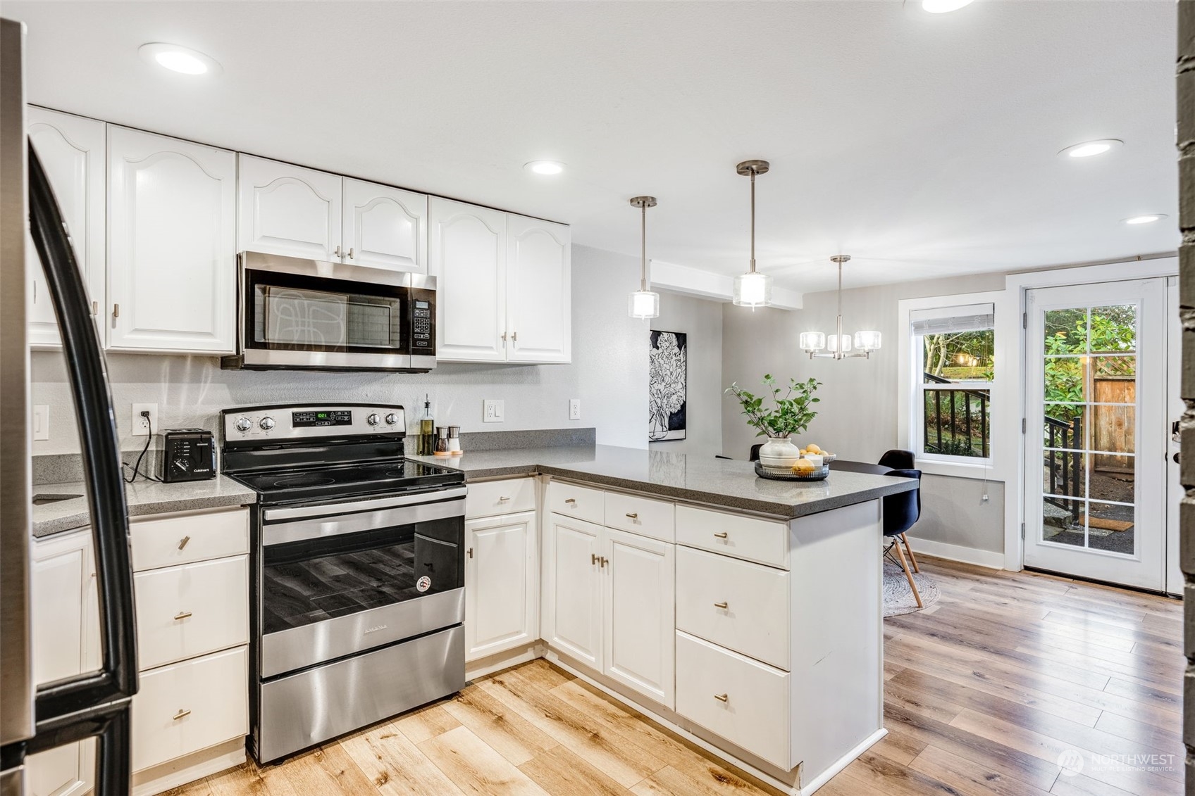 Unit C Kitchen and Dining Area, partial view of entrance