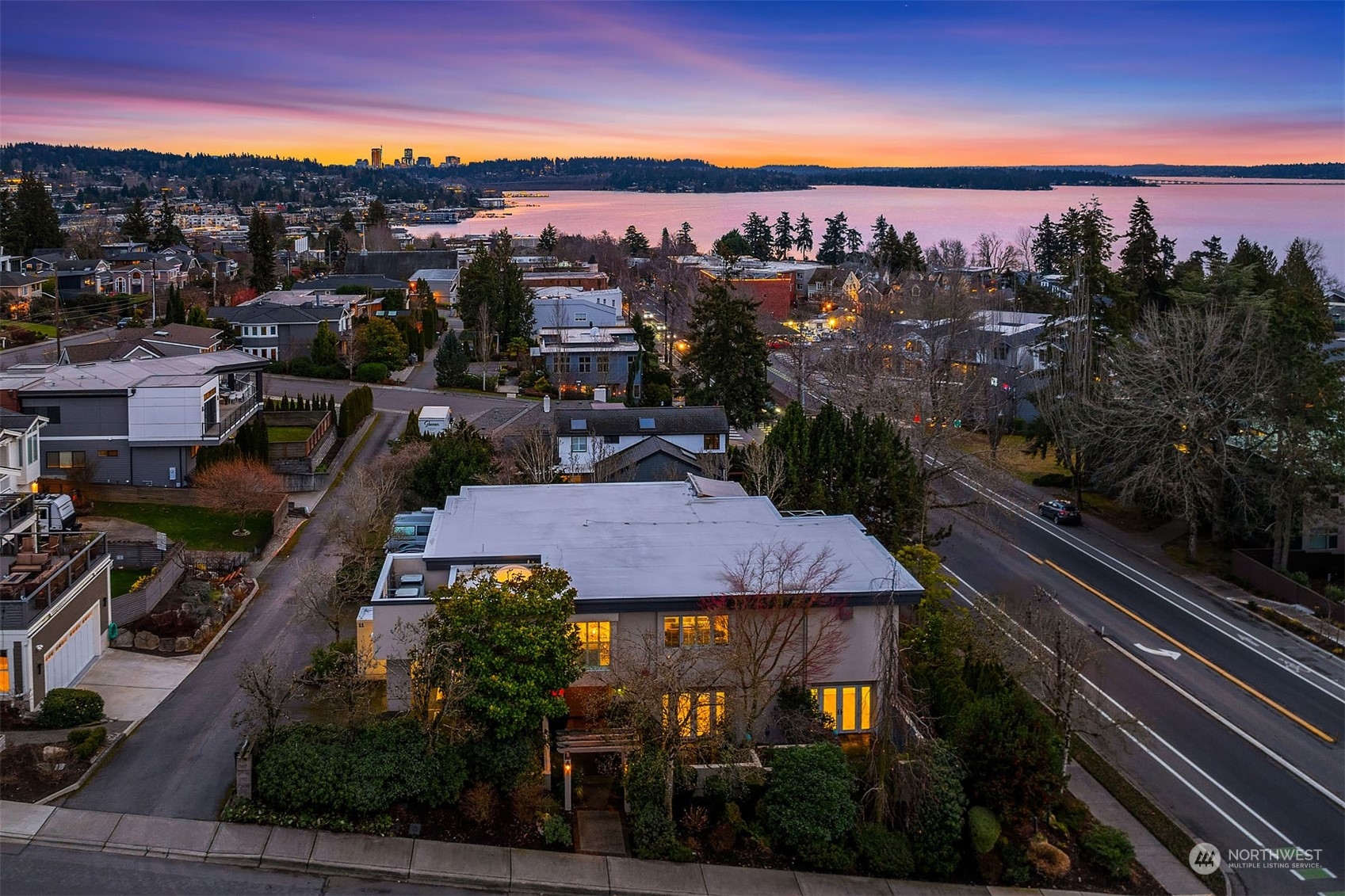 Enjoy a 10-second 'commute' to your office in DT Kirkland. Top floor apartment, middle floor office suites and lower level for your imagination.