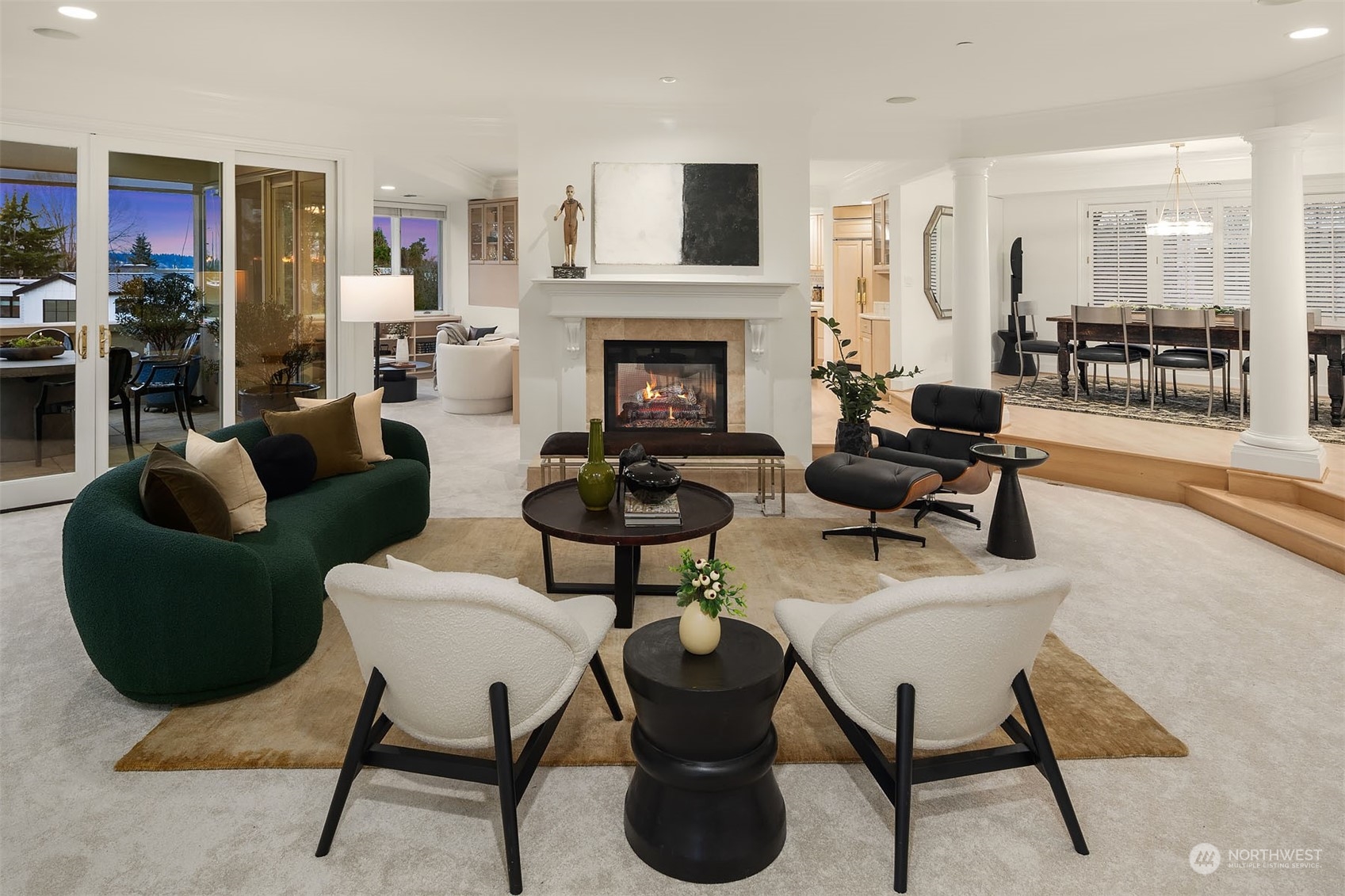 The main living room is large enough for any party, yet intimate with the double sided gas fireplace.