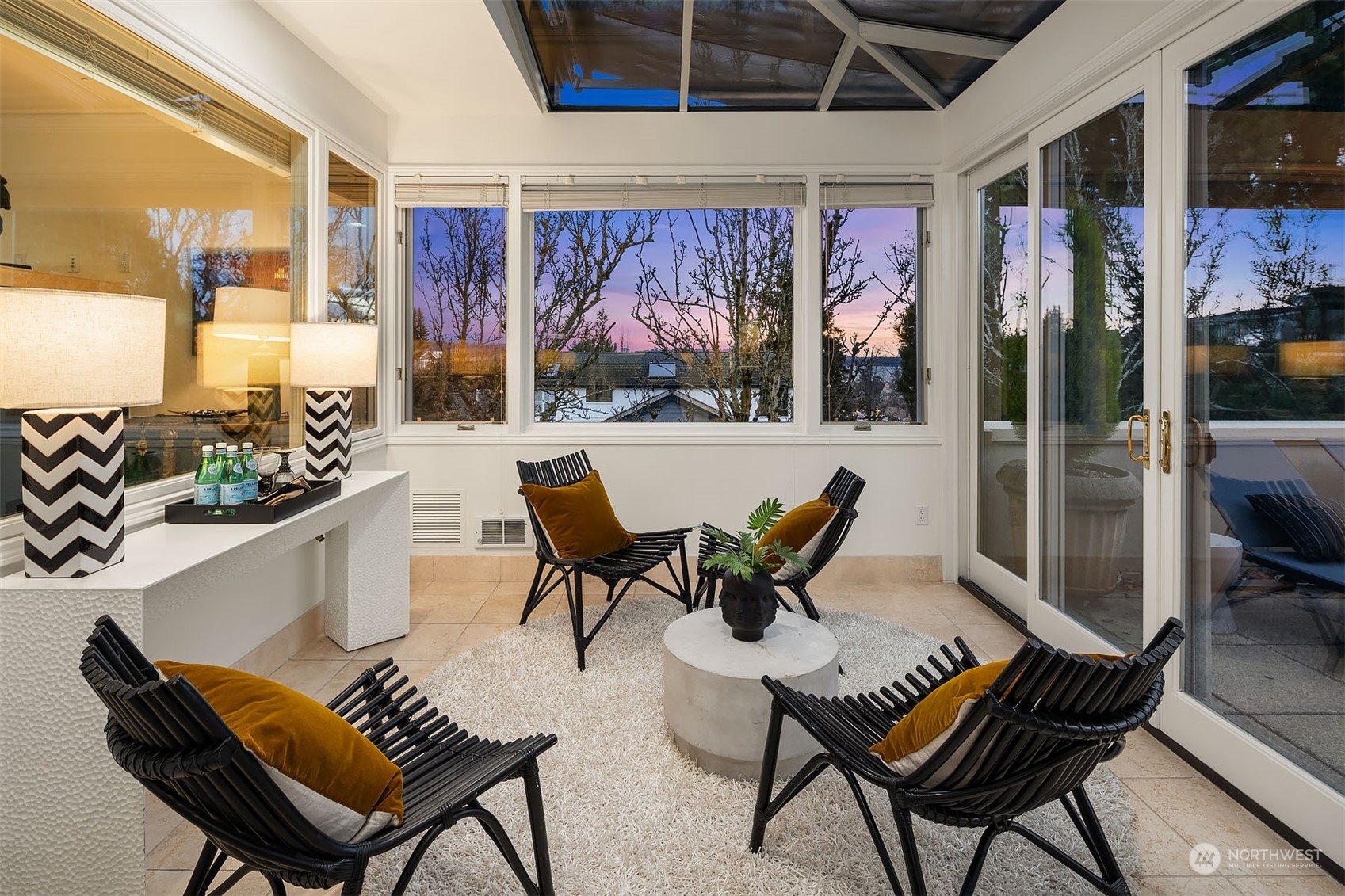 Who doesn't love a green room with retractable skylight? Perfect place to sit anytime of year.