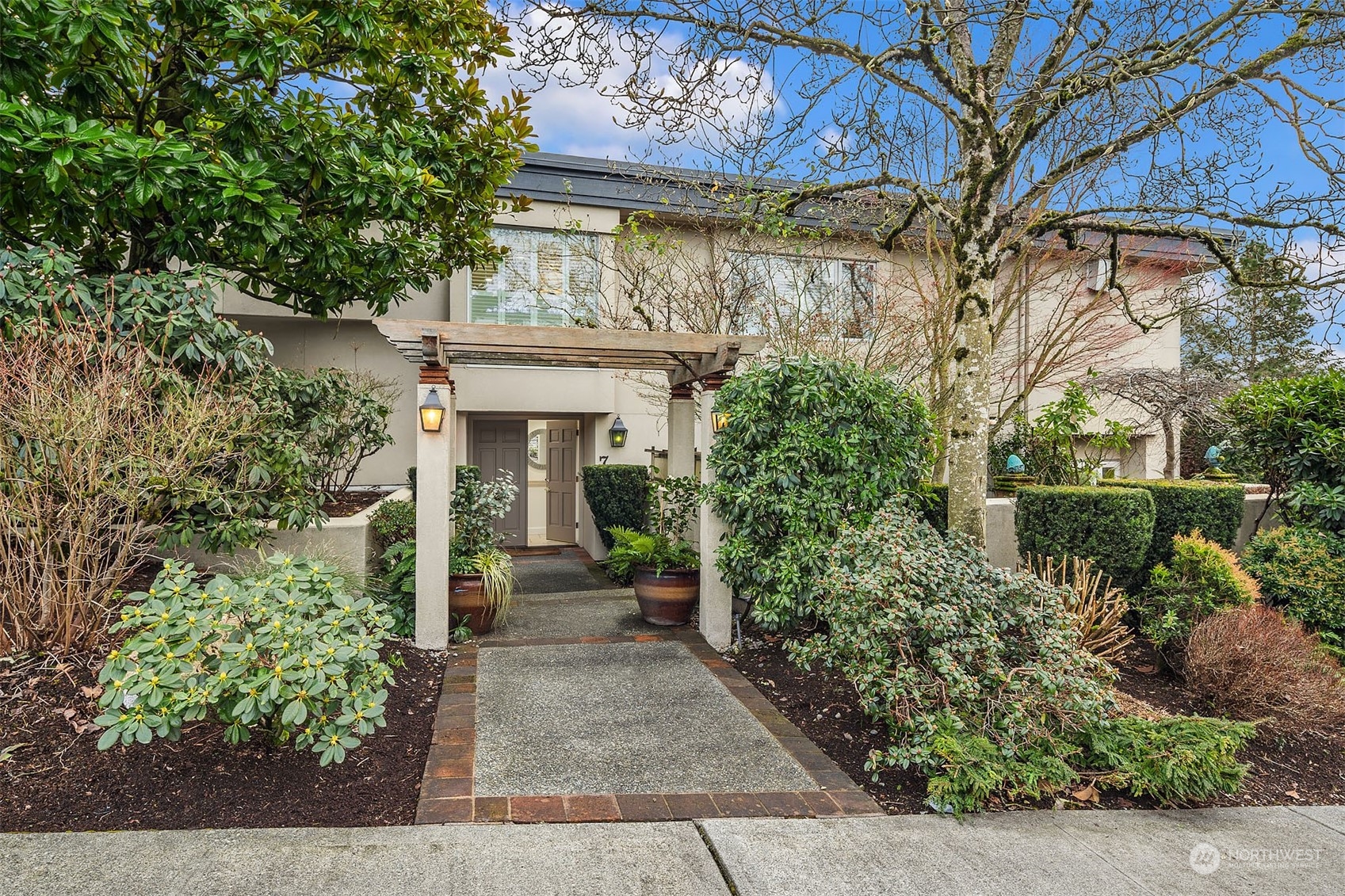 Professionally landscaped, with year round appeal, the gracious welcome to the home's front door.