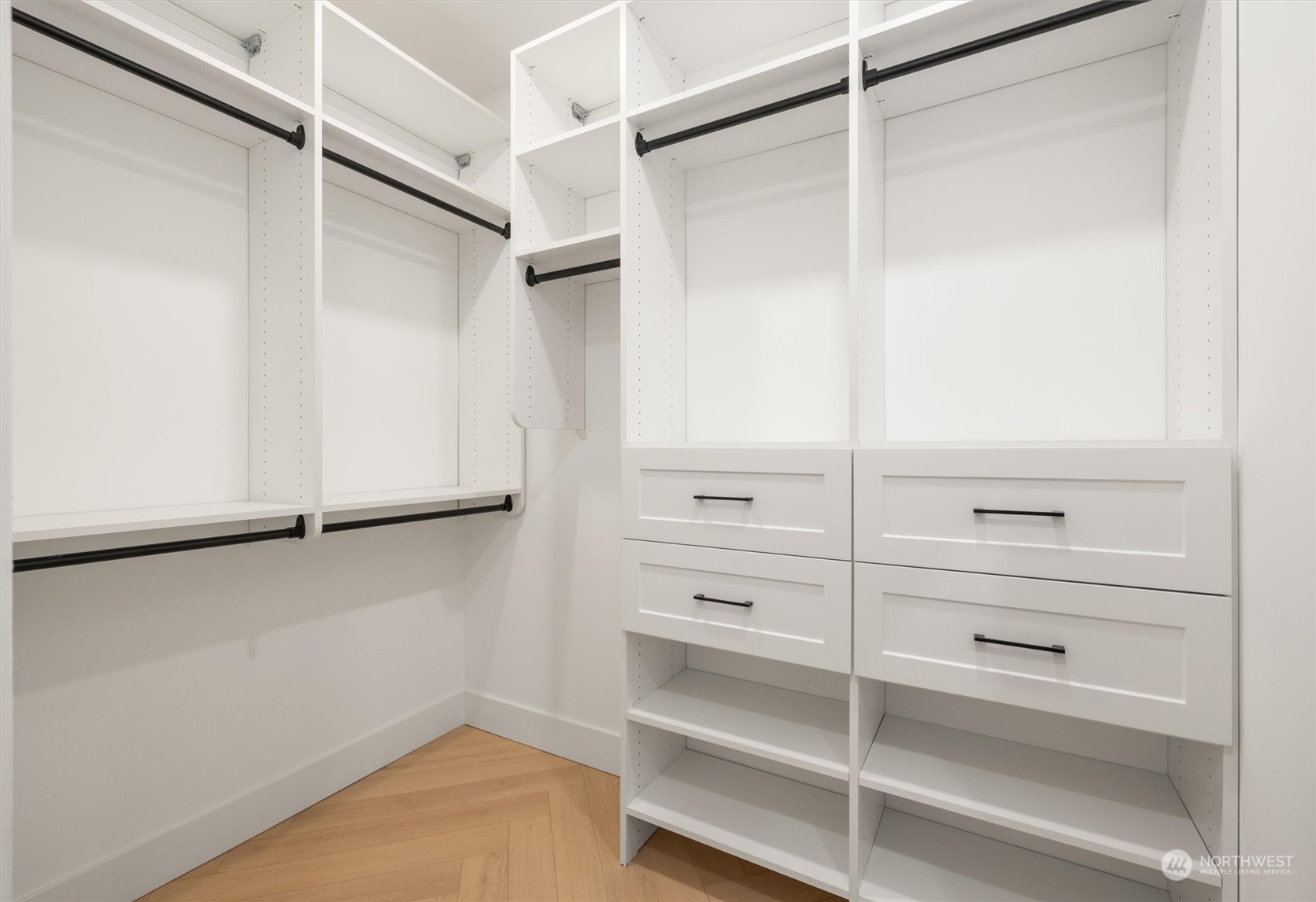 Primary Bedroom walk in closet.