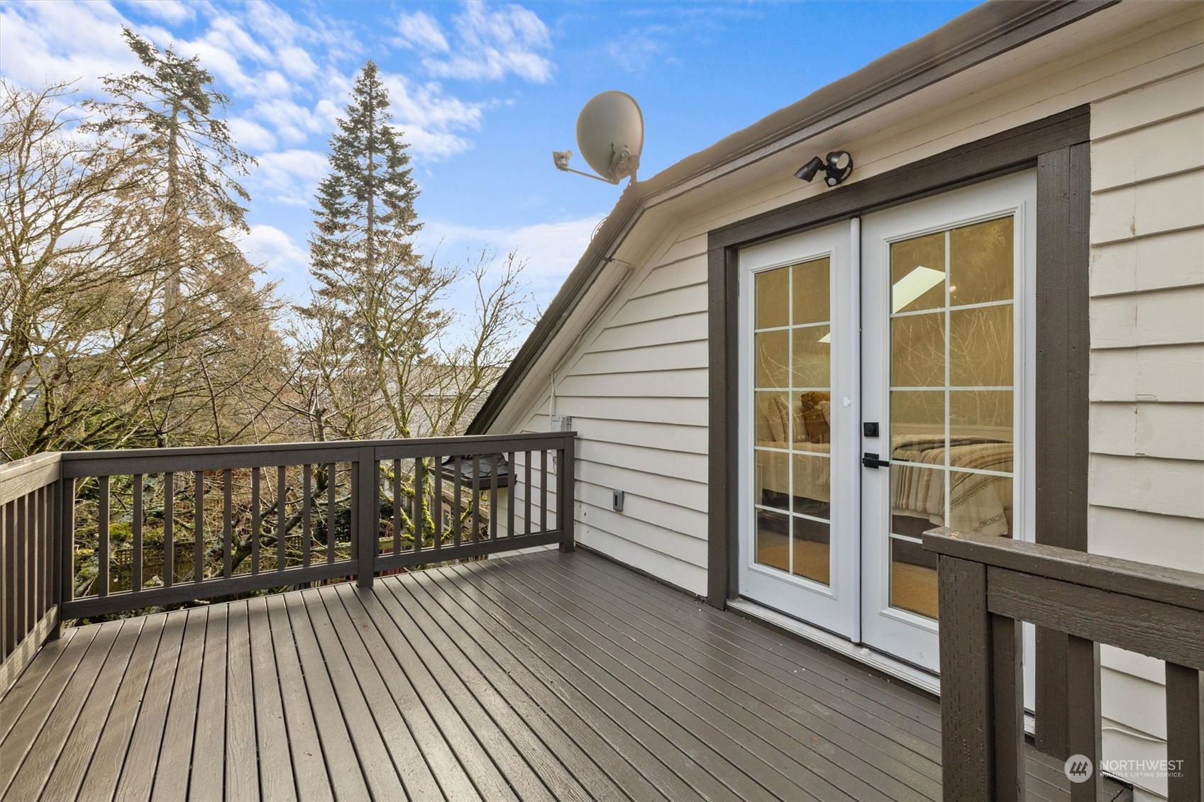 Deck off the large bedroom on upper level. You can enjoy some sneaky good Views from this deck.