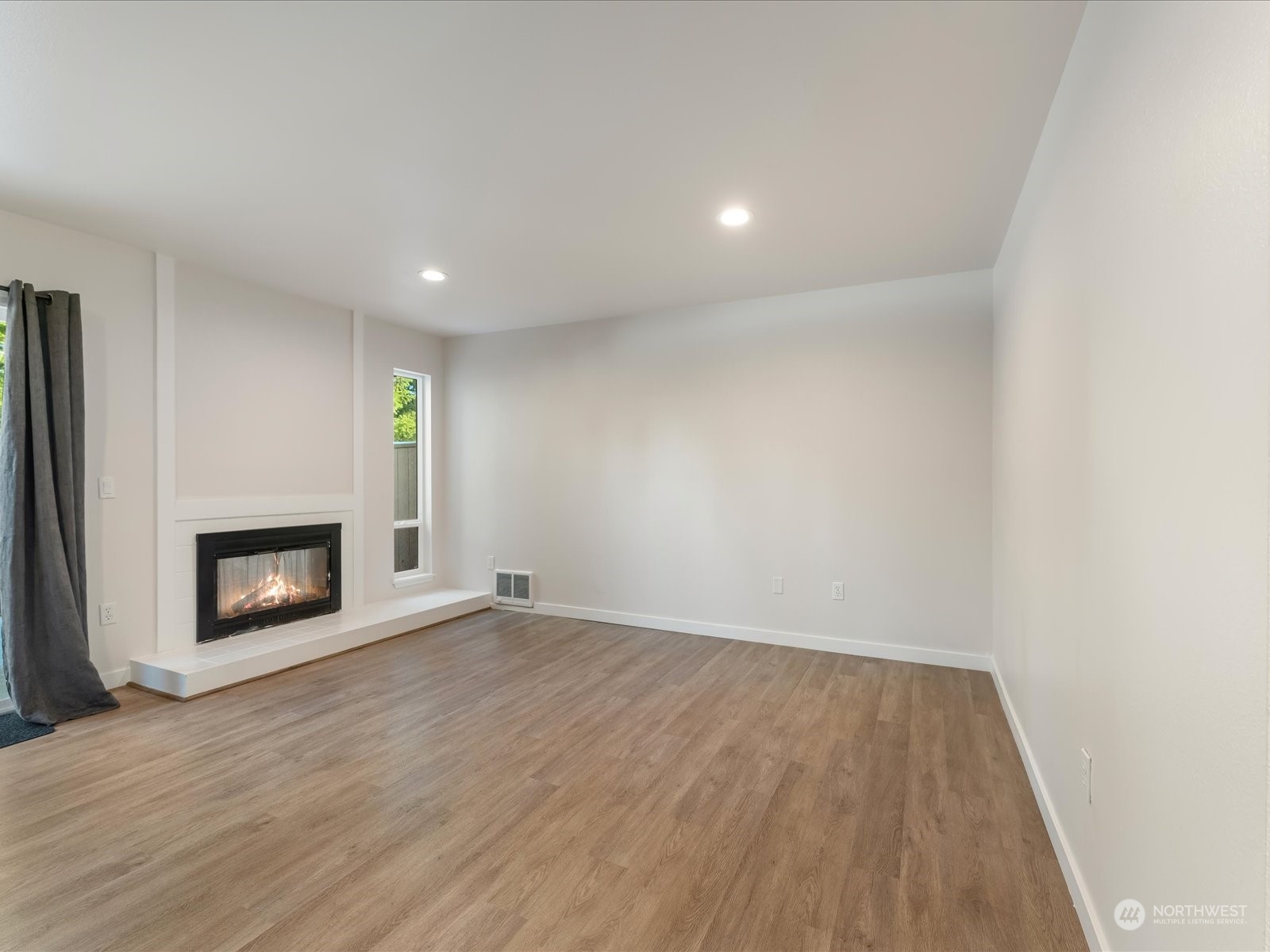 Family room with real wood fireplace