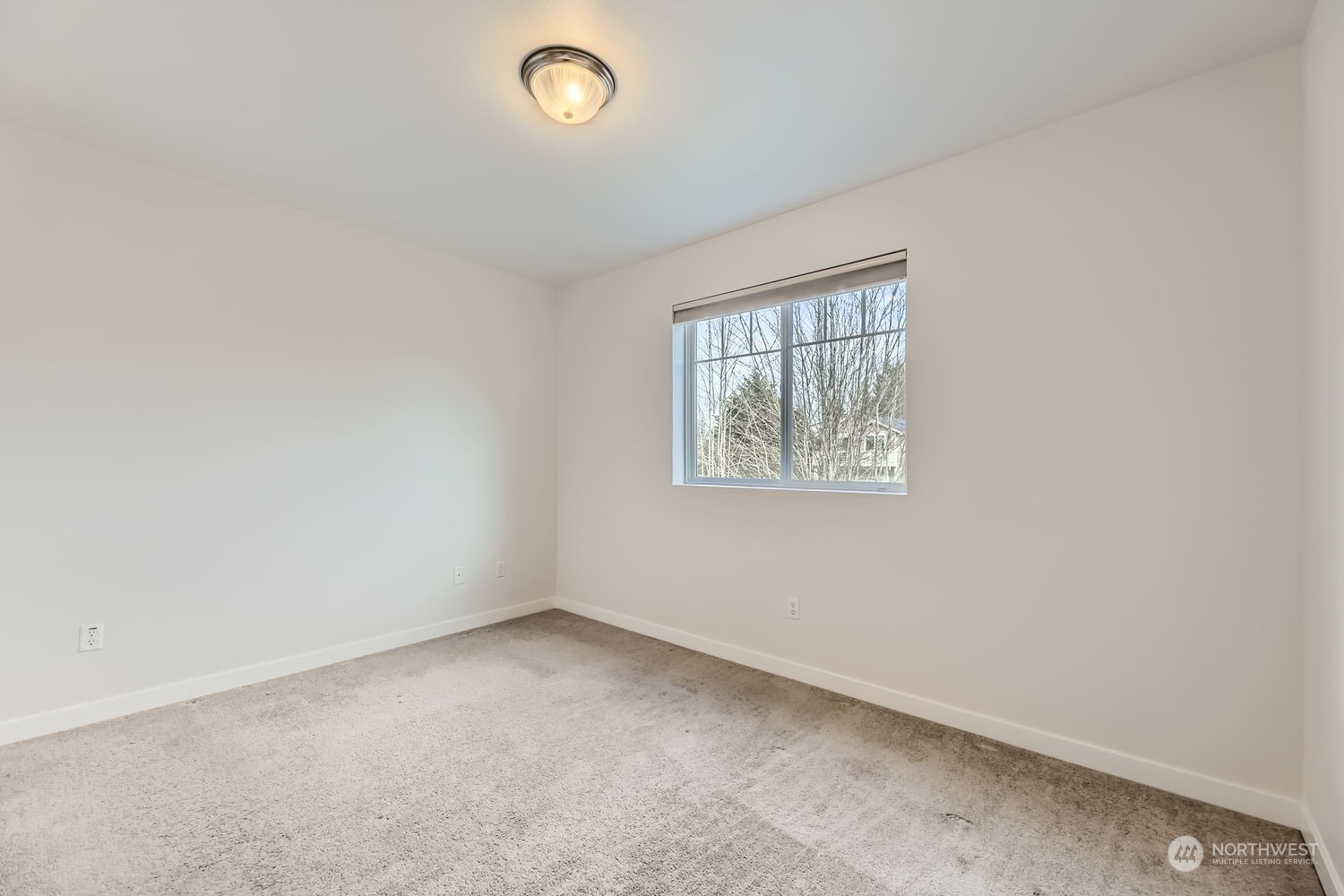 Upstairs hall bathroom has large vanity, abundant storage, and tub/shower