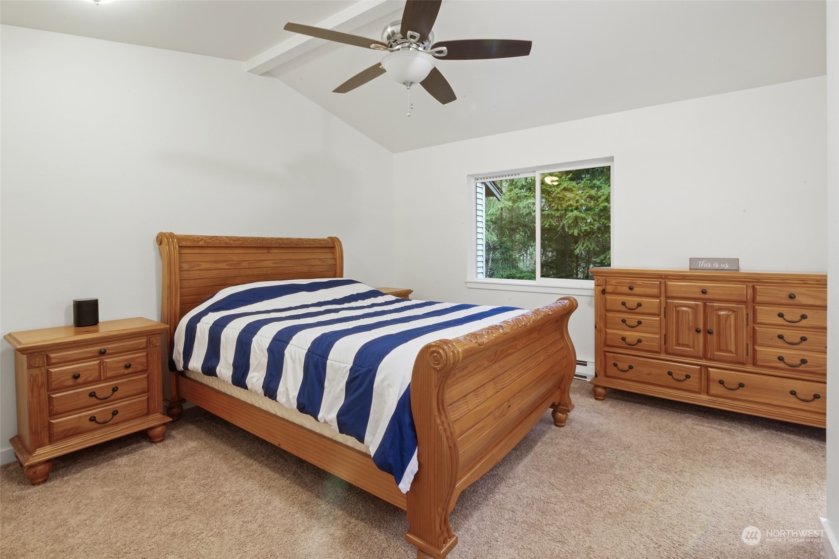 New ceiling fan and vaulted ceiling.