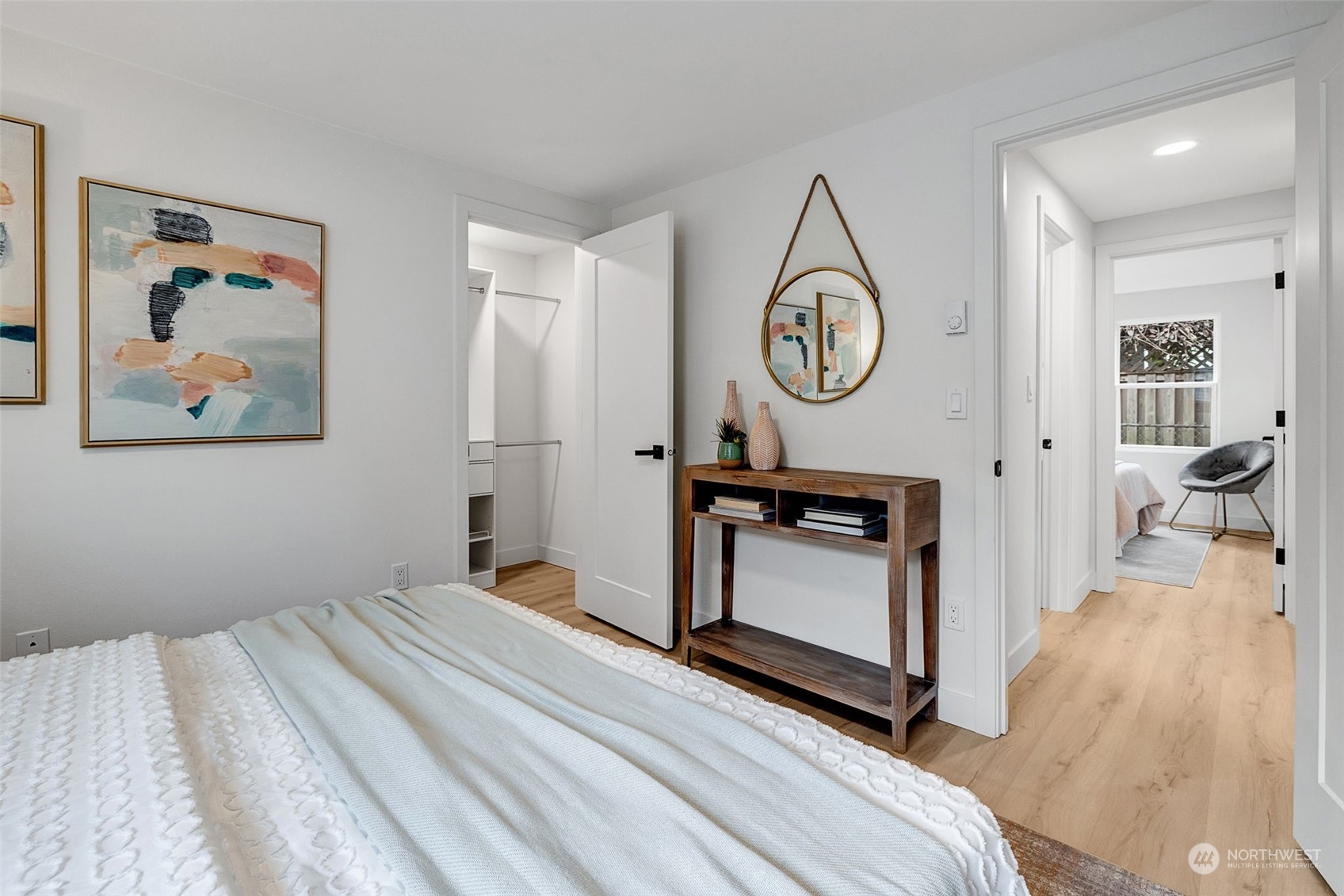 The primary bedroom features a custom walk-in closet, (not often found in this era of home...)