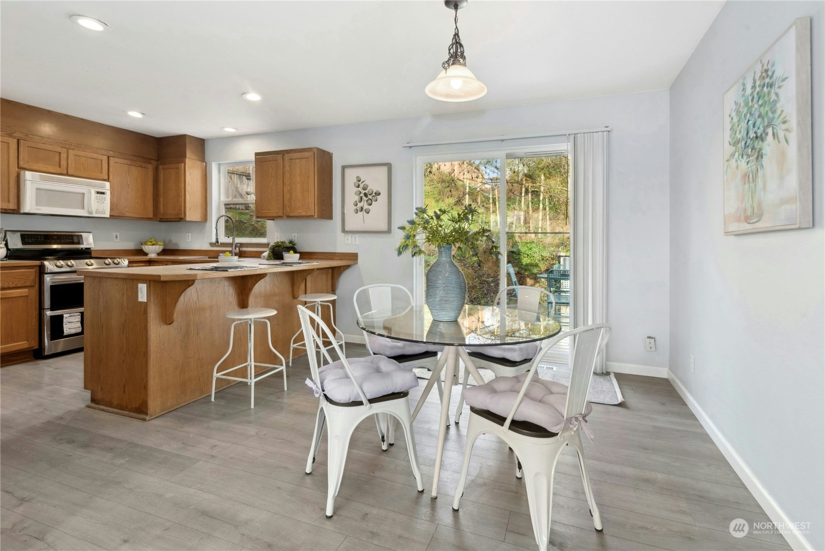 Open kitchen space leads to back deck.