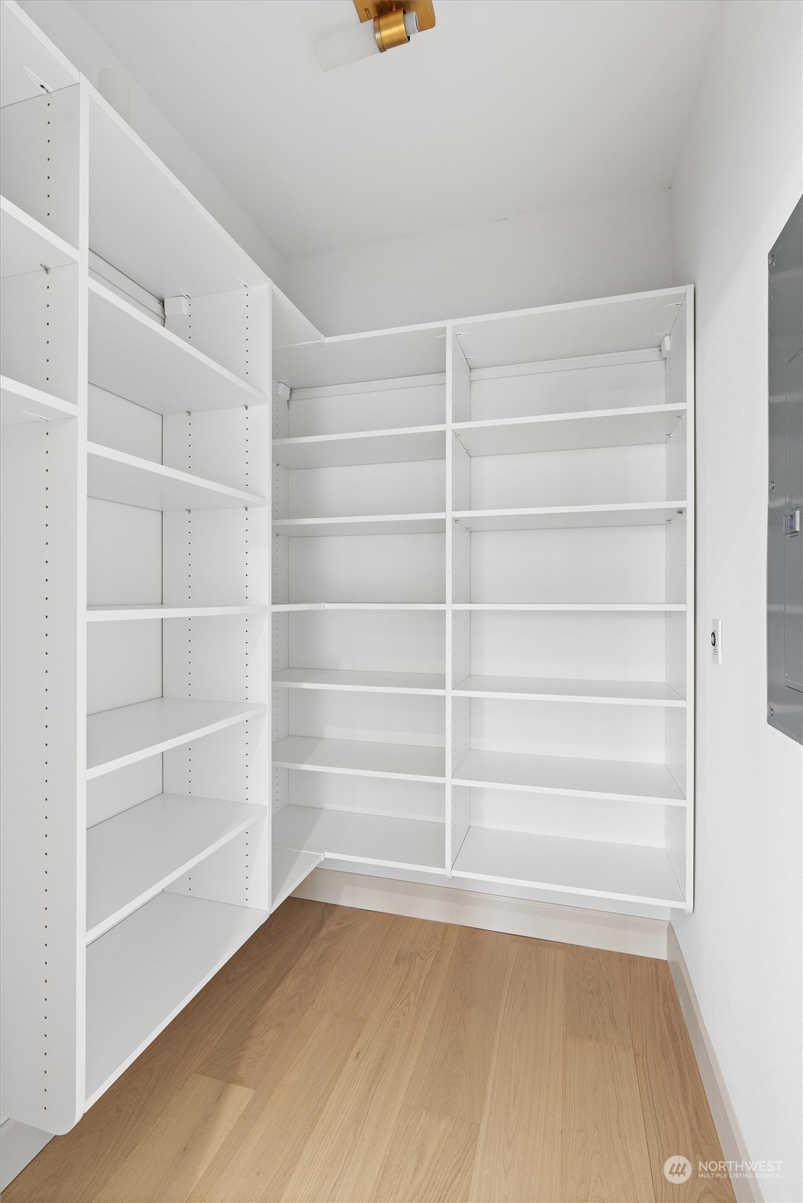 Walk in pantry where the barn door is located.