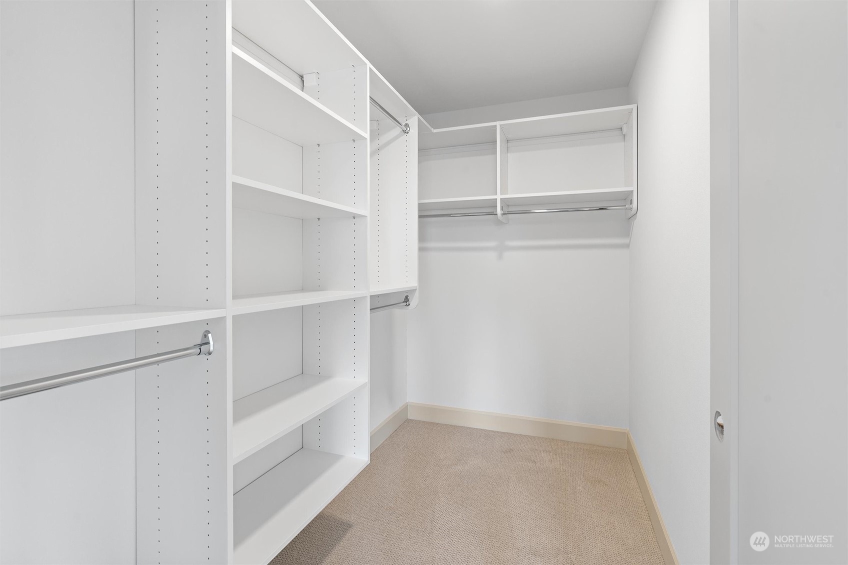 Primary Suite walk in Closet.