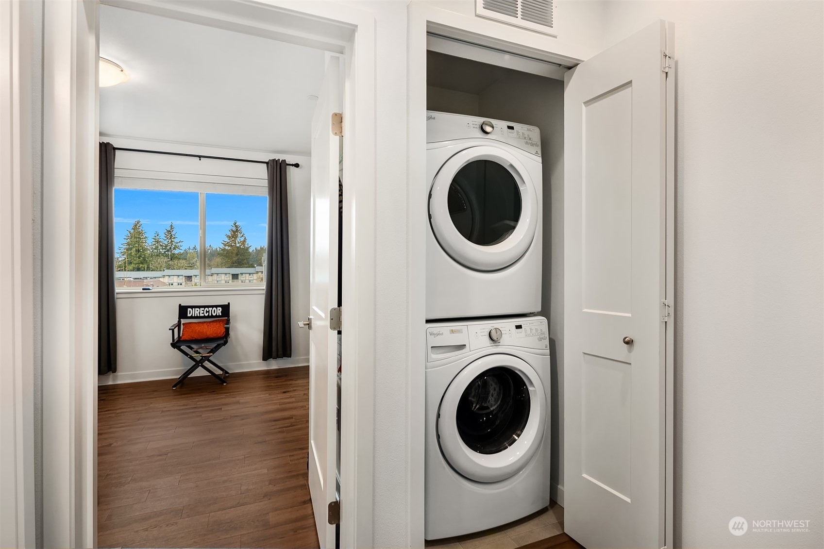 Convenient in-unit laundry tucked away for a seamless look.