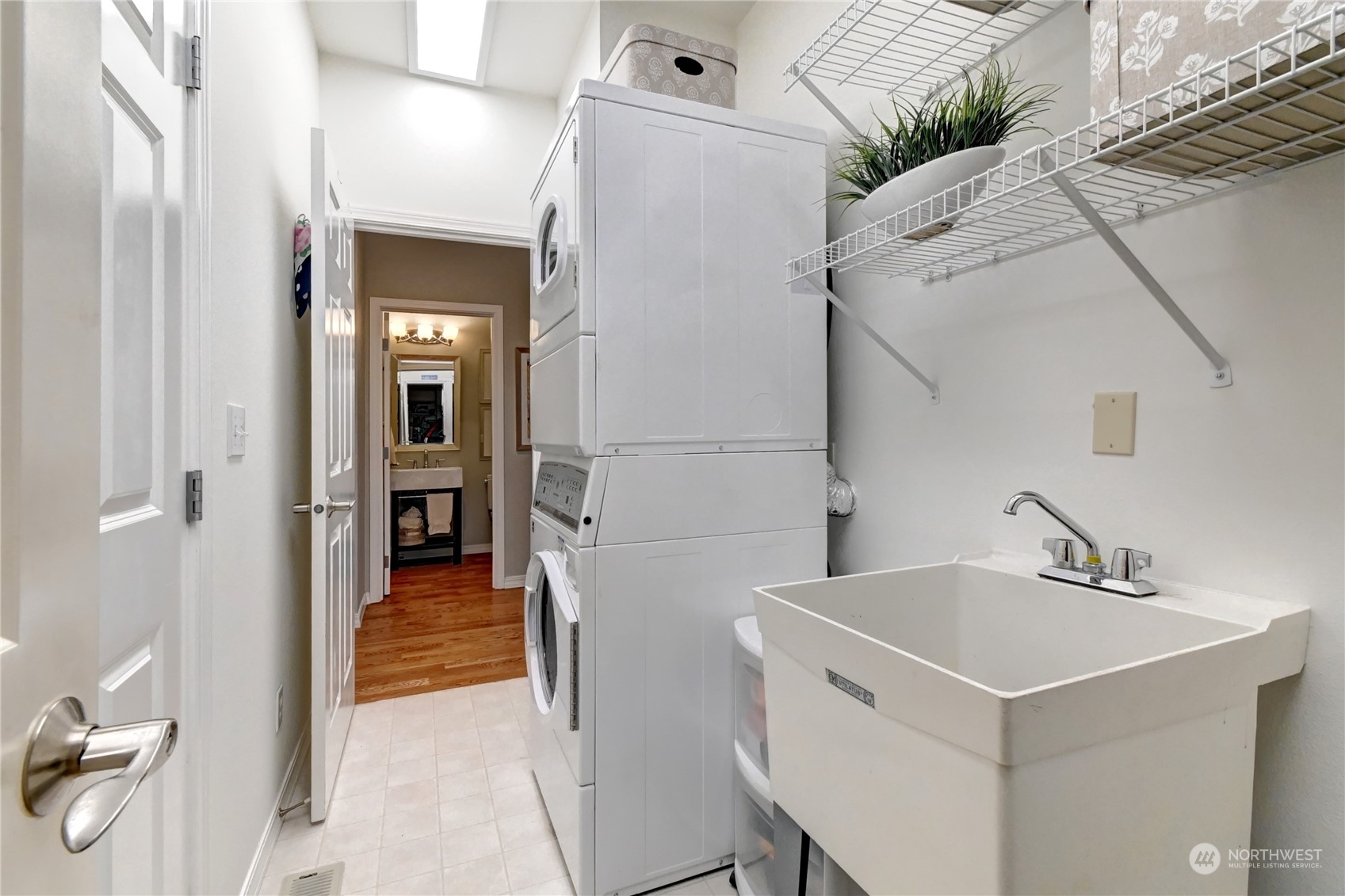 Laundry room with sink and tons of storage