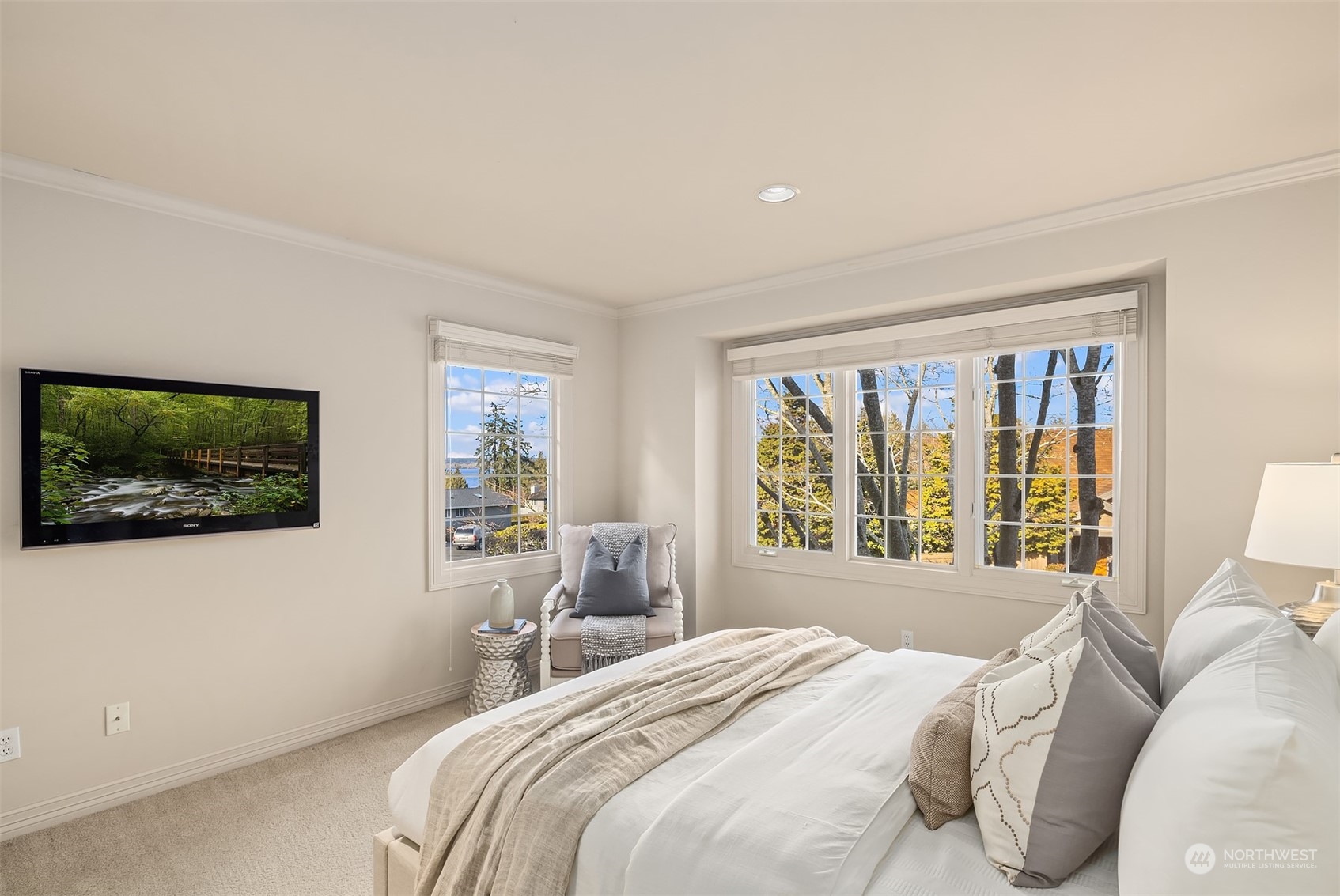 Guest bedroom with peek-a-boo lake views.