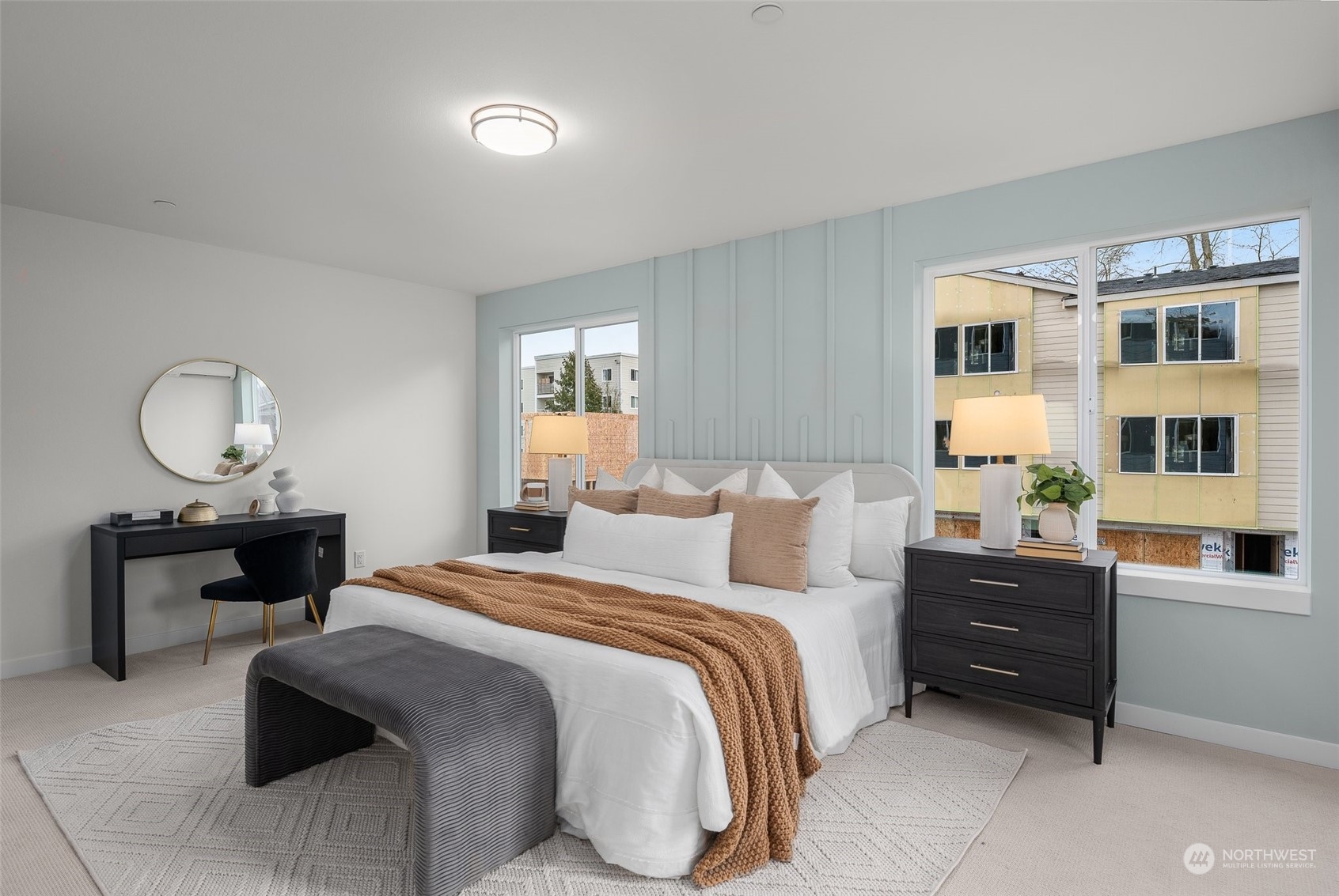 Step into the primary model suite—a tranquil retreat bathed in soft natural light. From the custom wall detail to the spacious layout, this room offers the perfect balance of luxury and relaxation.