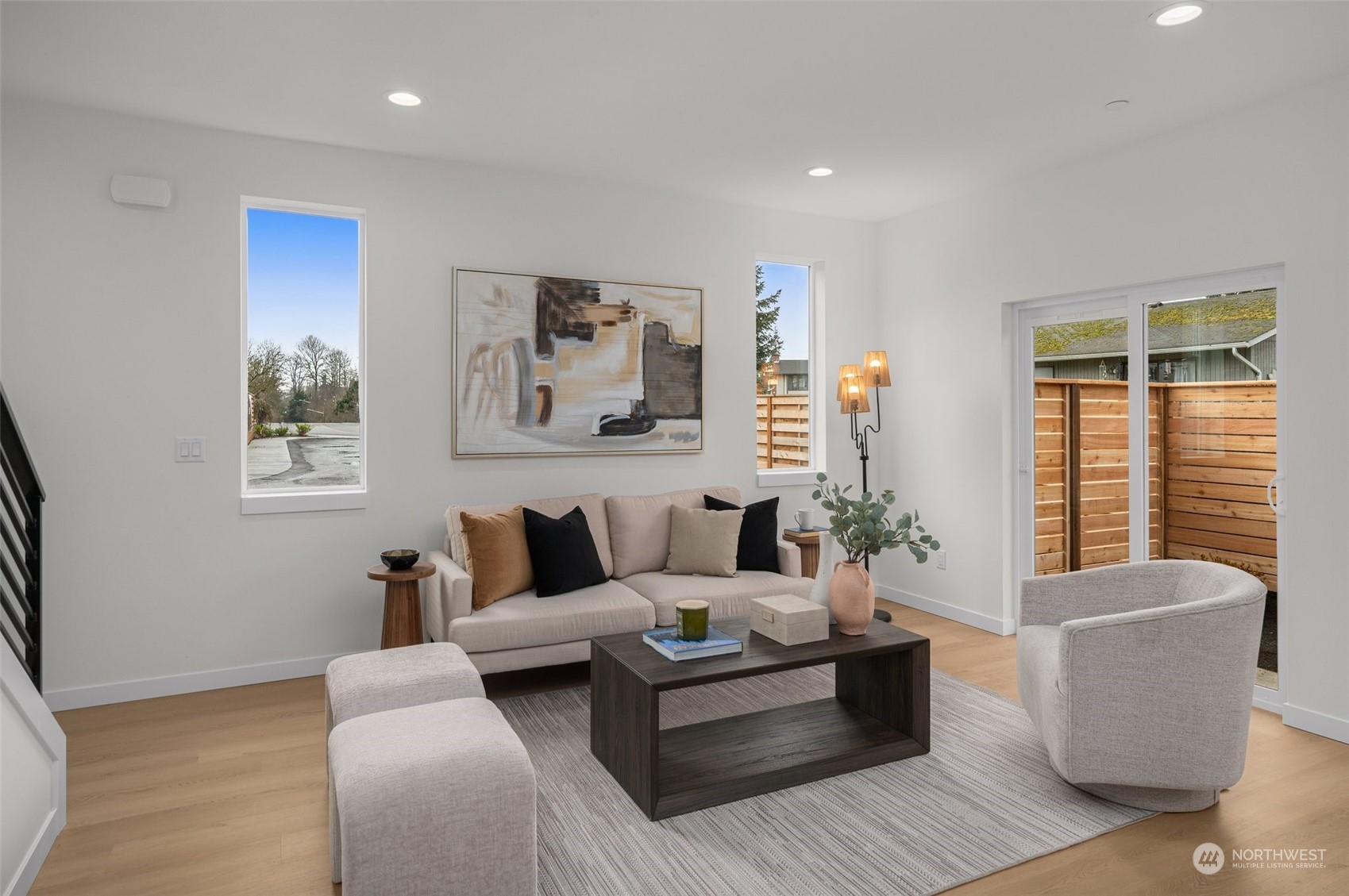 Gather, dine, and create memories in this expansive main level. The seamless flow from this model home's space make entertaining a breeze. Sliding doors connect you to outdoor tranquility.