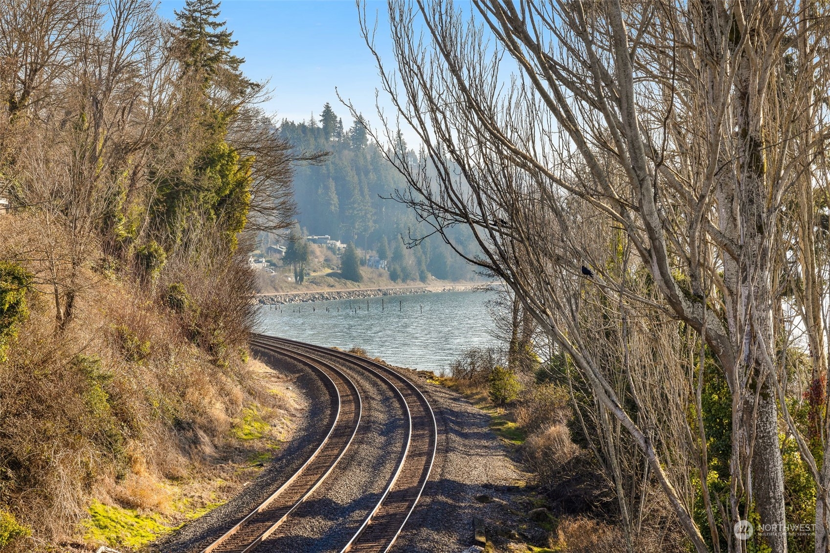 A charming rail-side view adds to the character of this location, offering scenic pathways and lush greenery.