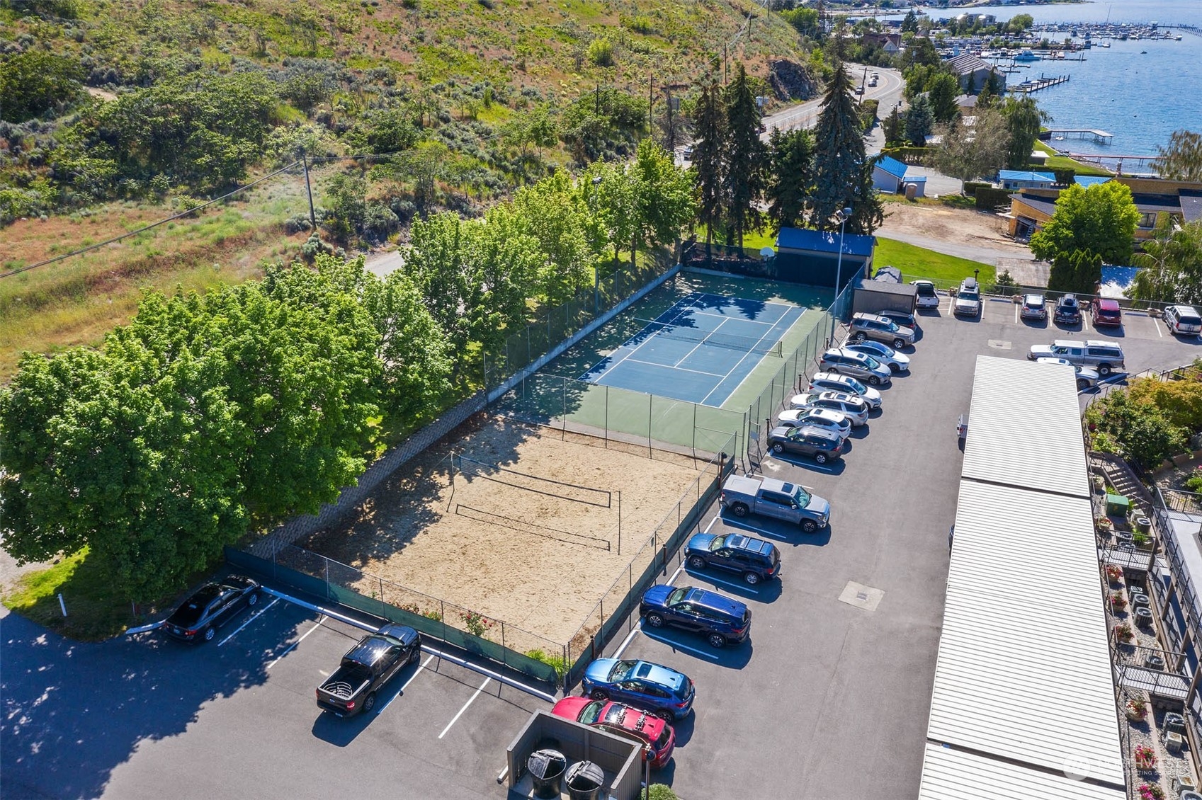 Lots of overflow parking near athletic courts.