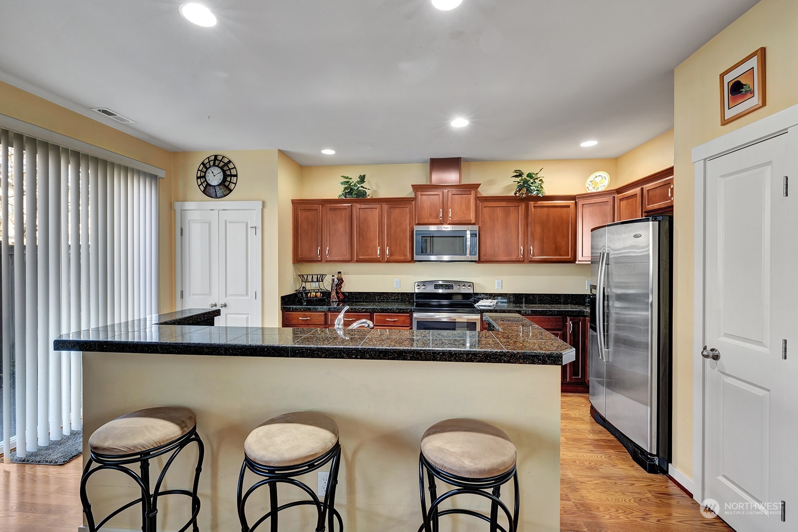 Well appointed kitchen with Island & breakfast bar.