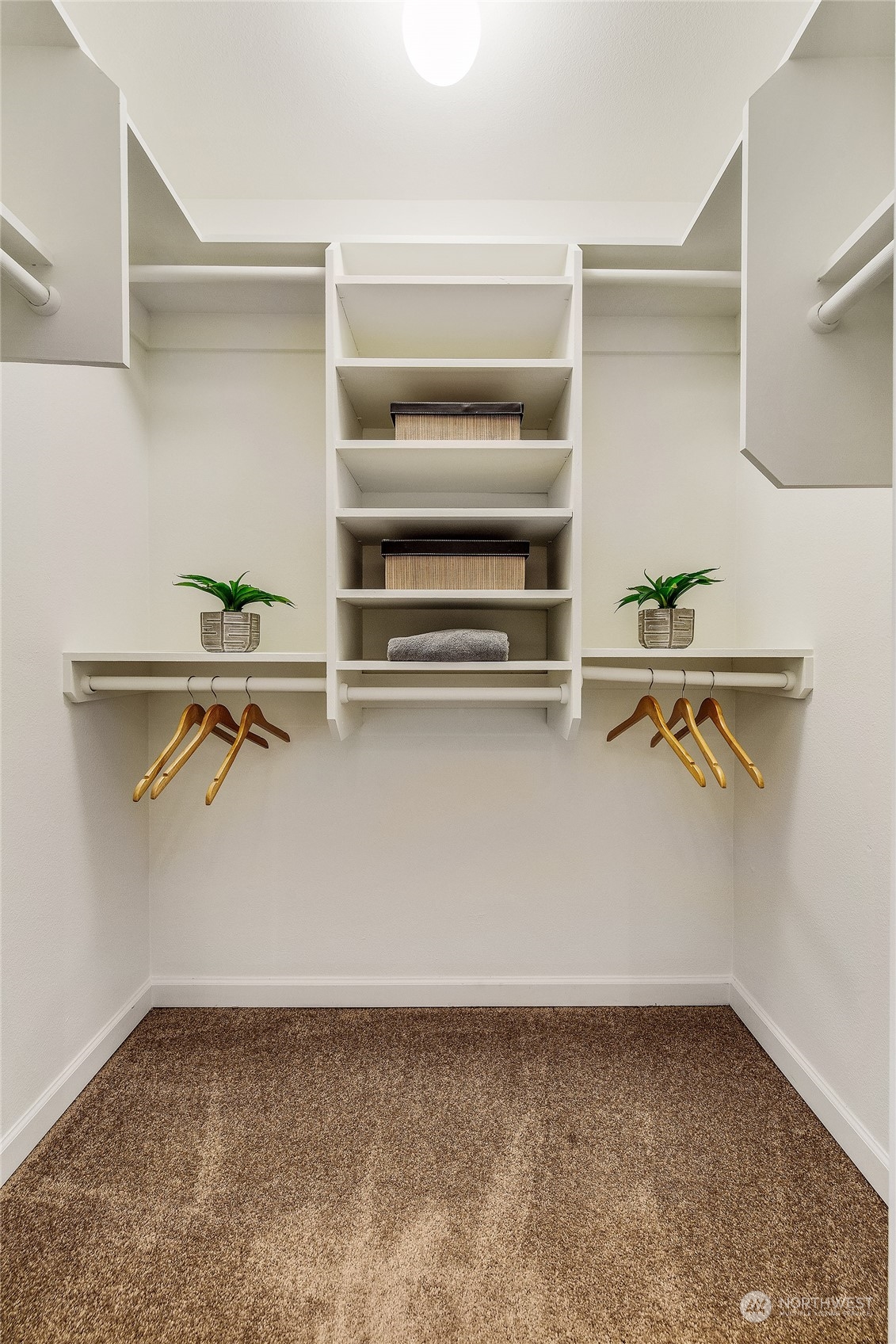 Large primary walk-in closet.