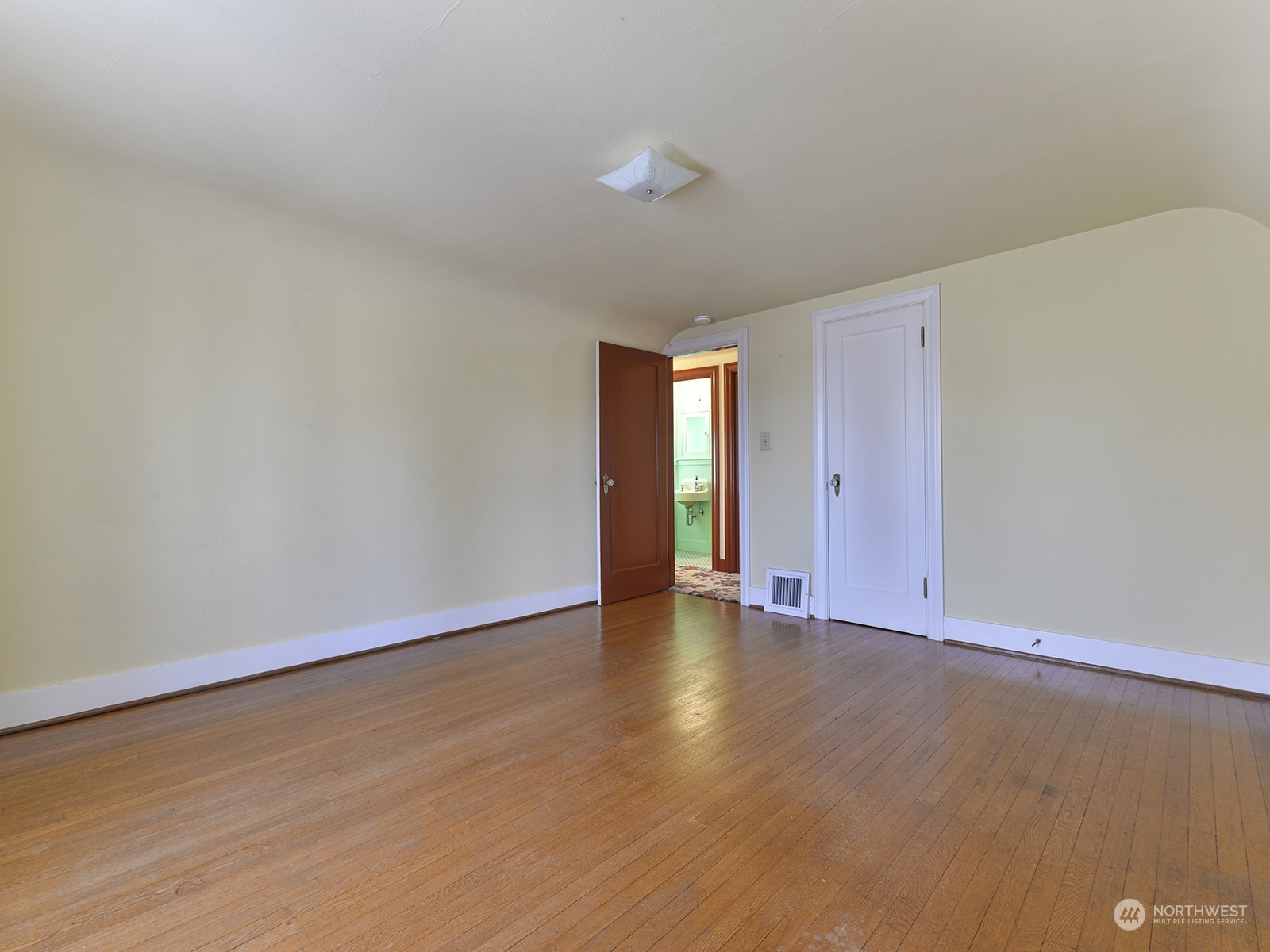 The spacious, second upstairs bedroom.