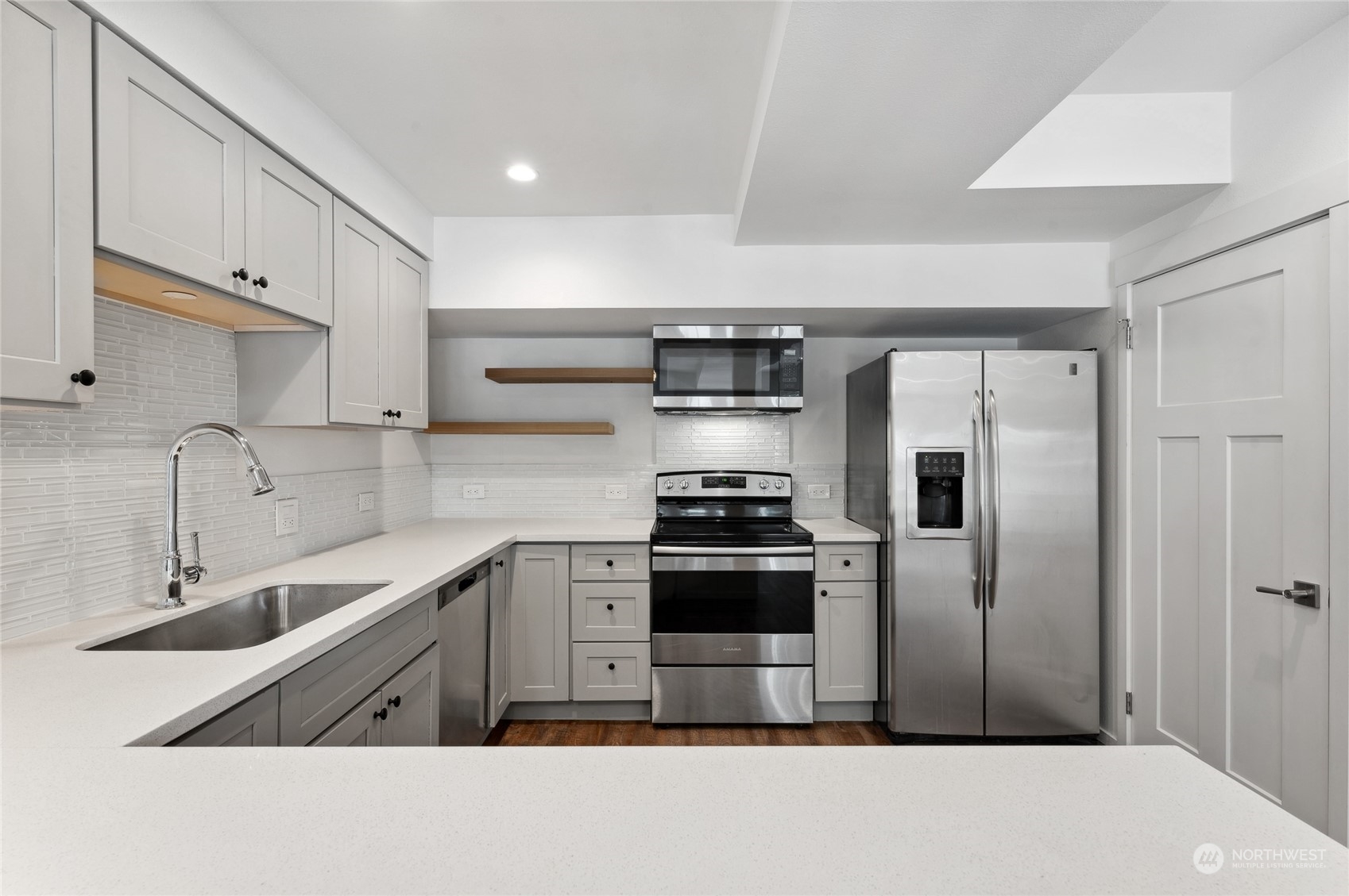 Guest suite kitchen and eating counter.