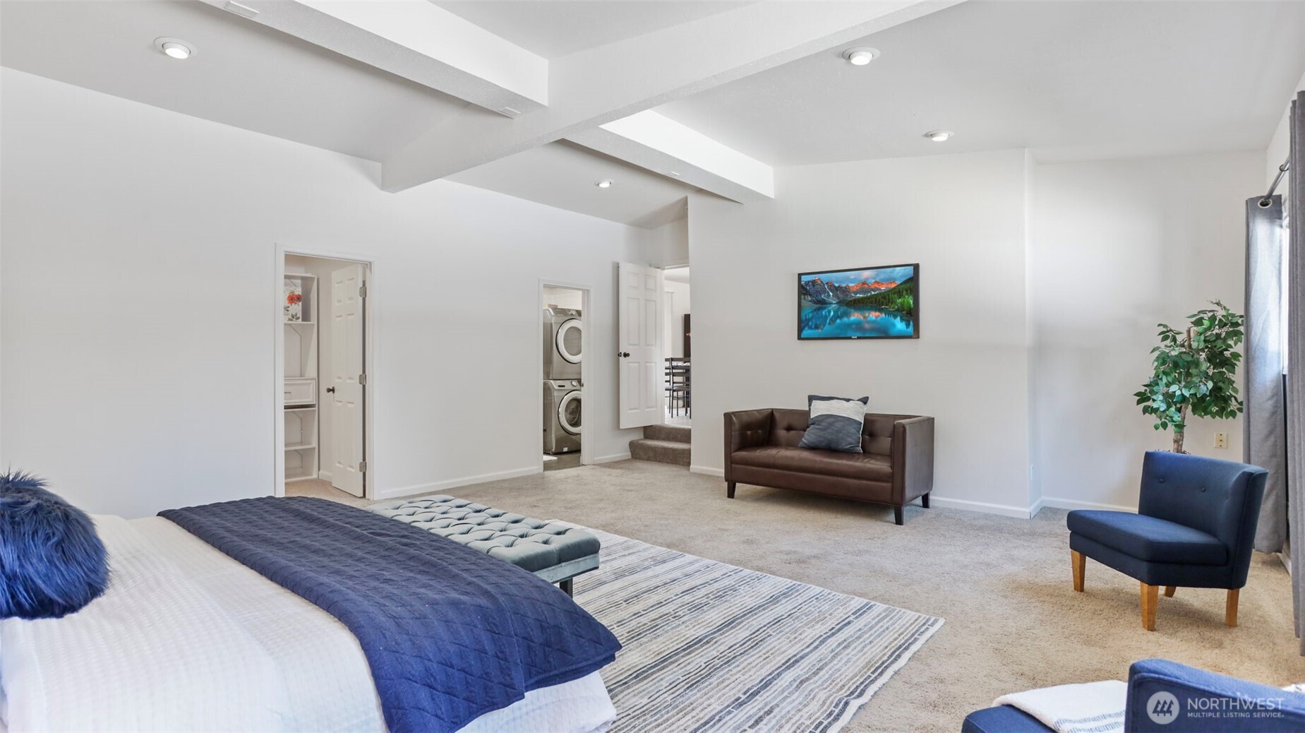 Retreat to this massive primary with large walk-in closet and full bath en suite.