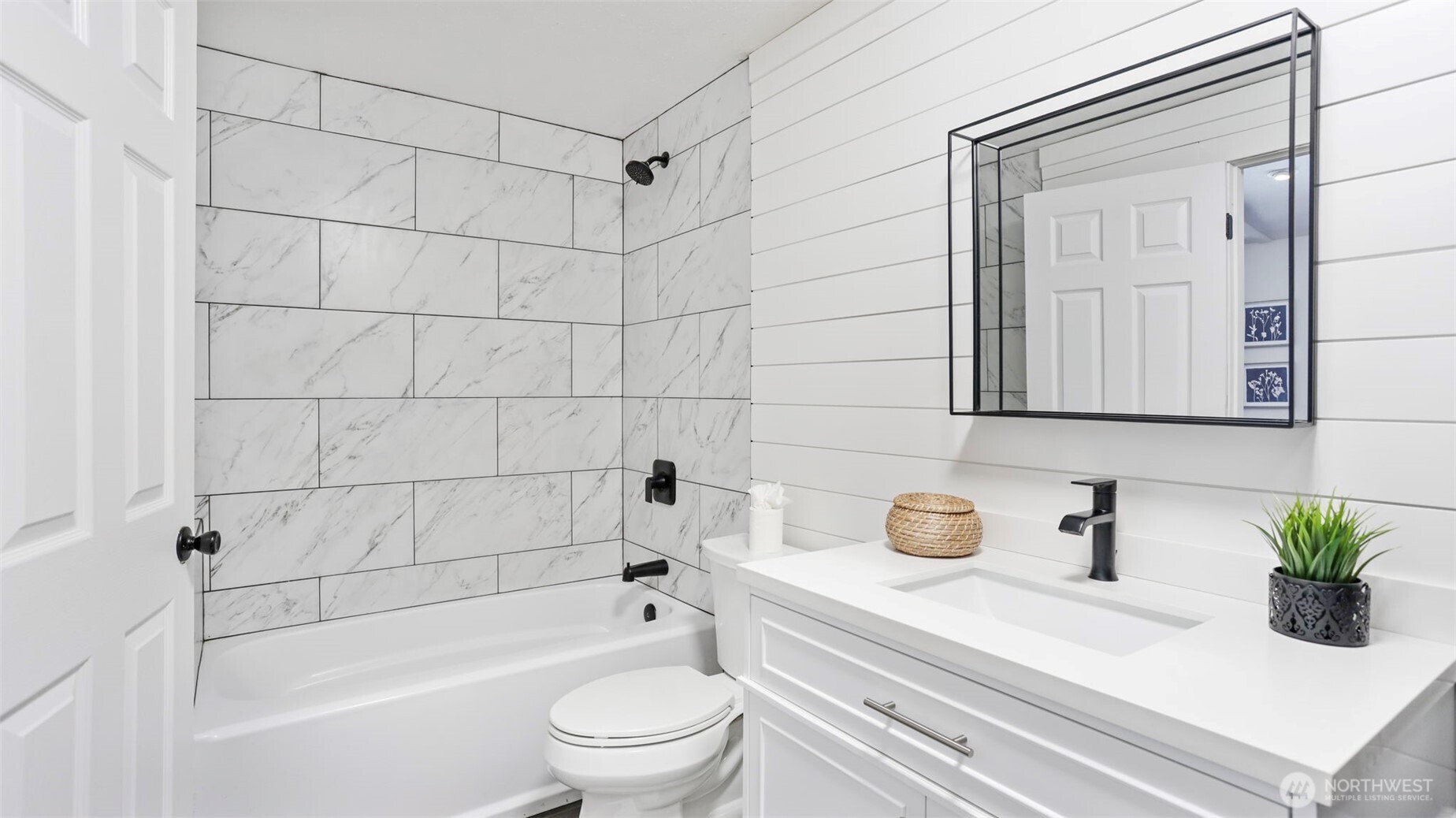 Enjoy vaulted ceilings and walls of windows in the primary.