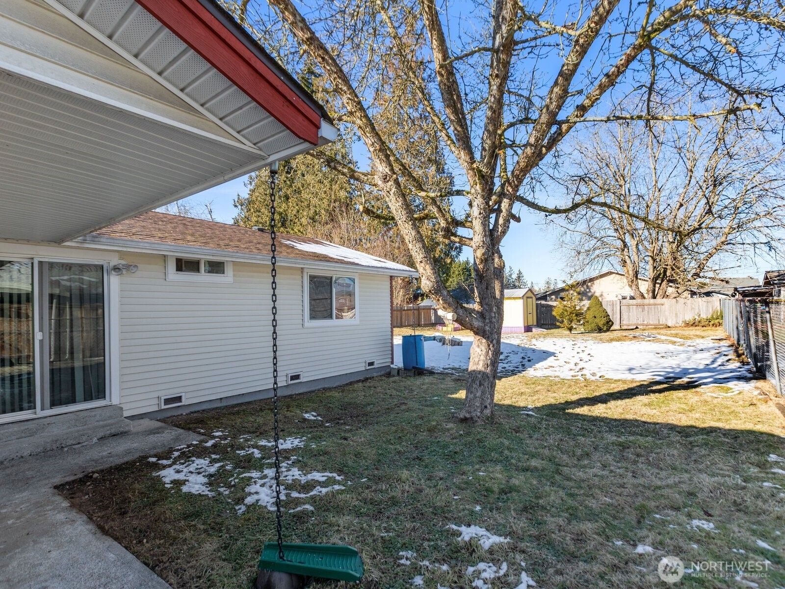 Right side of home past garage