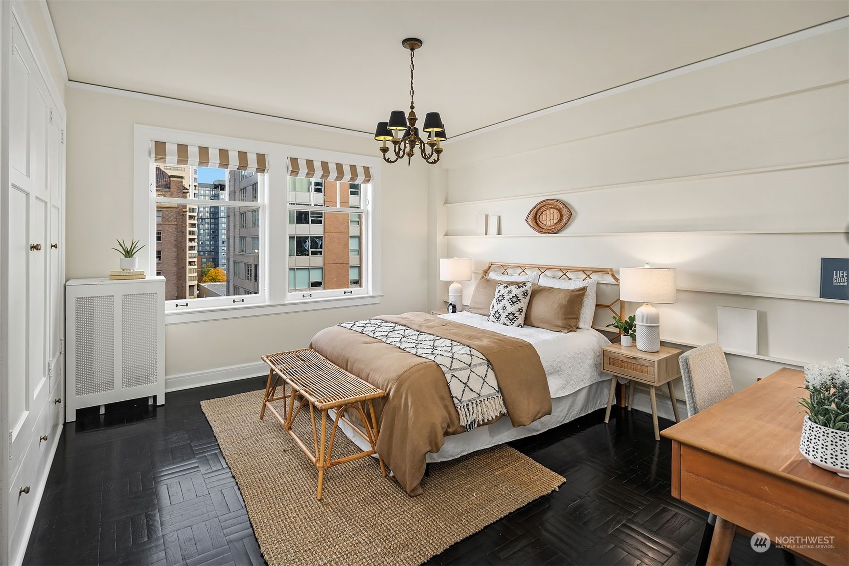 The second bedroom features more generous closets and more vintage lighting.