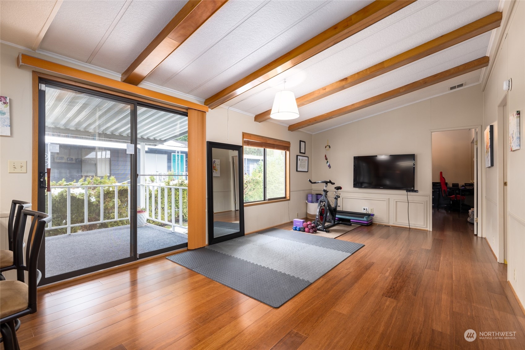 extra living space off the kitchen with slider to the generous covered porch