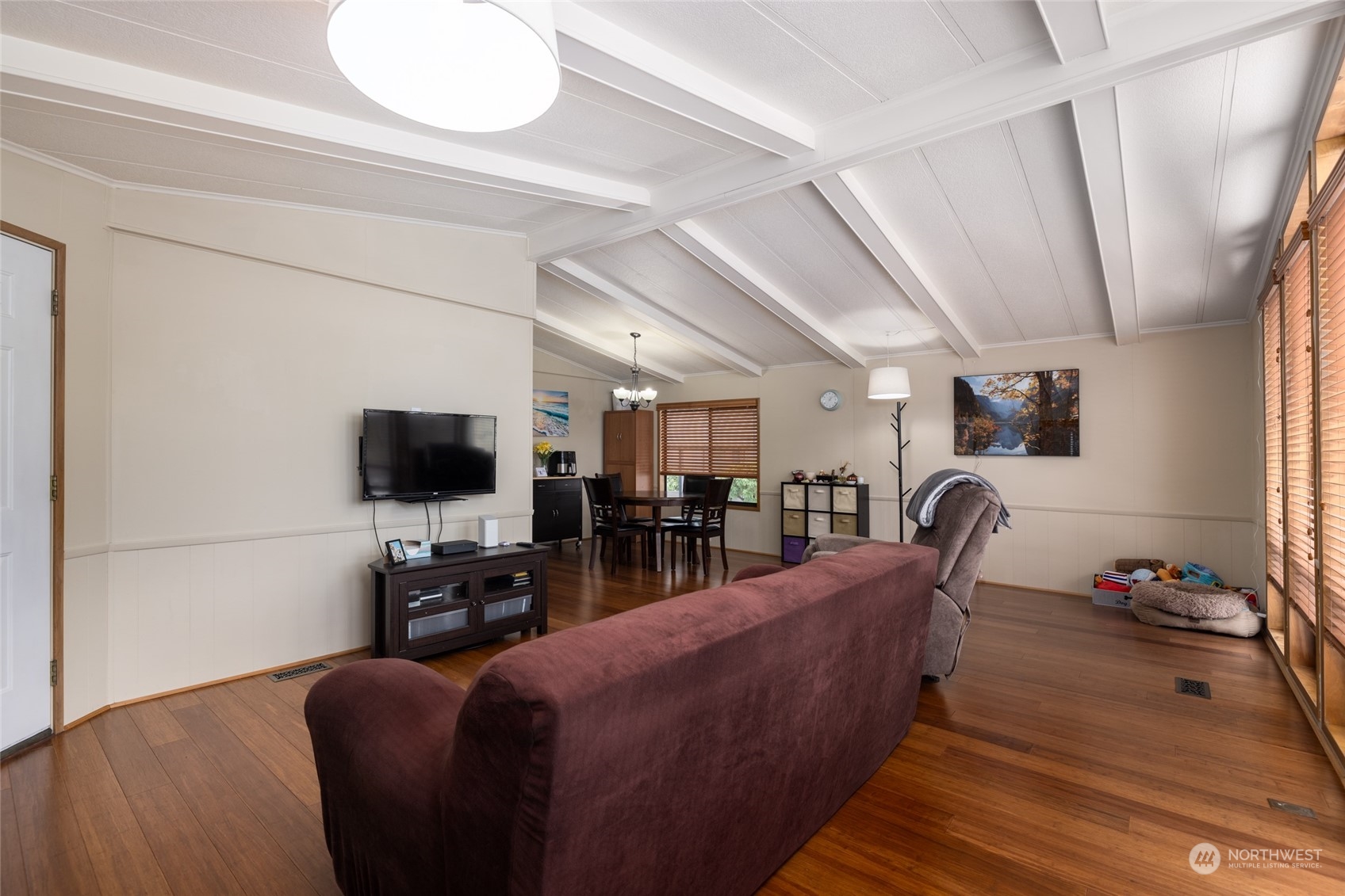 living room with view into dining space