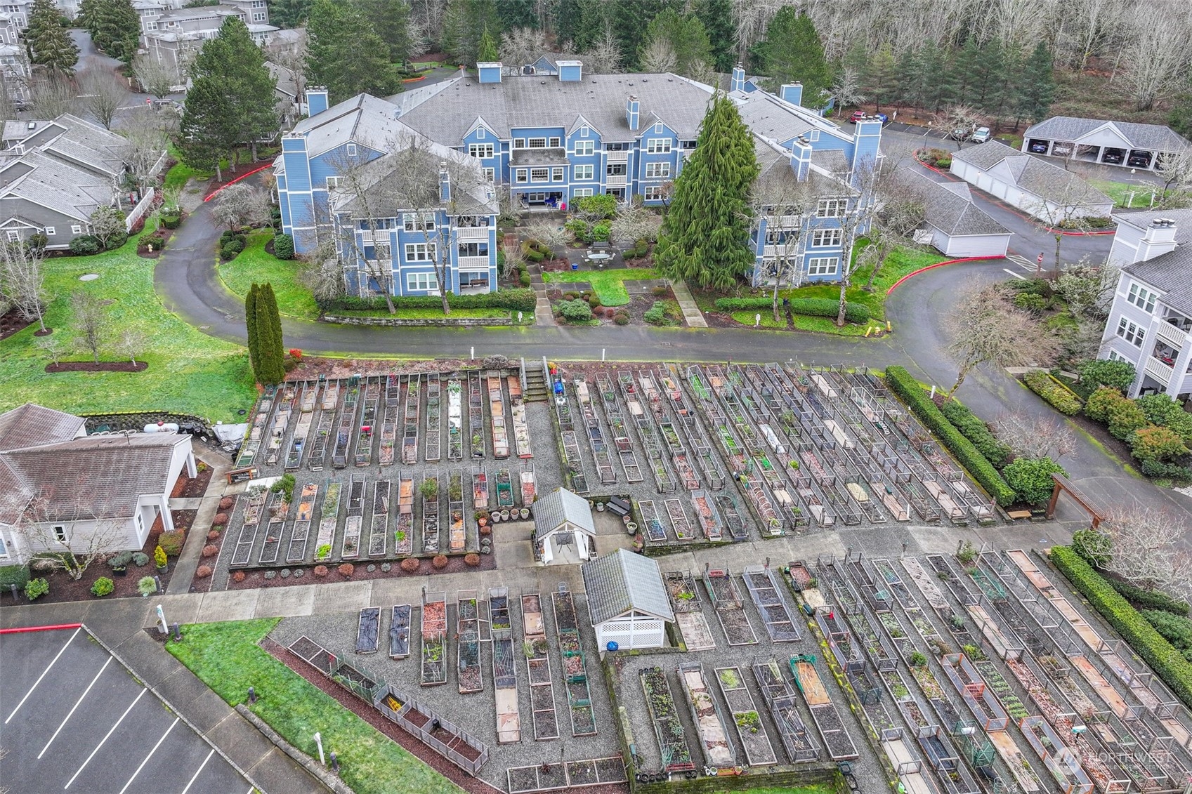 A "Pea Patch" garden space with individual plots for residents who enjoy gardening, promoting an active lifestyle and fresh produce cultivation.