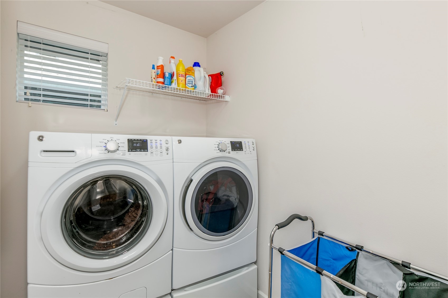 Utility room conveniently located upstairs.