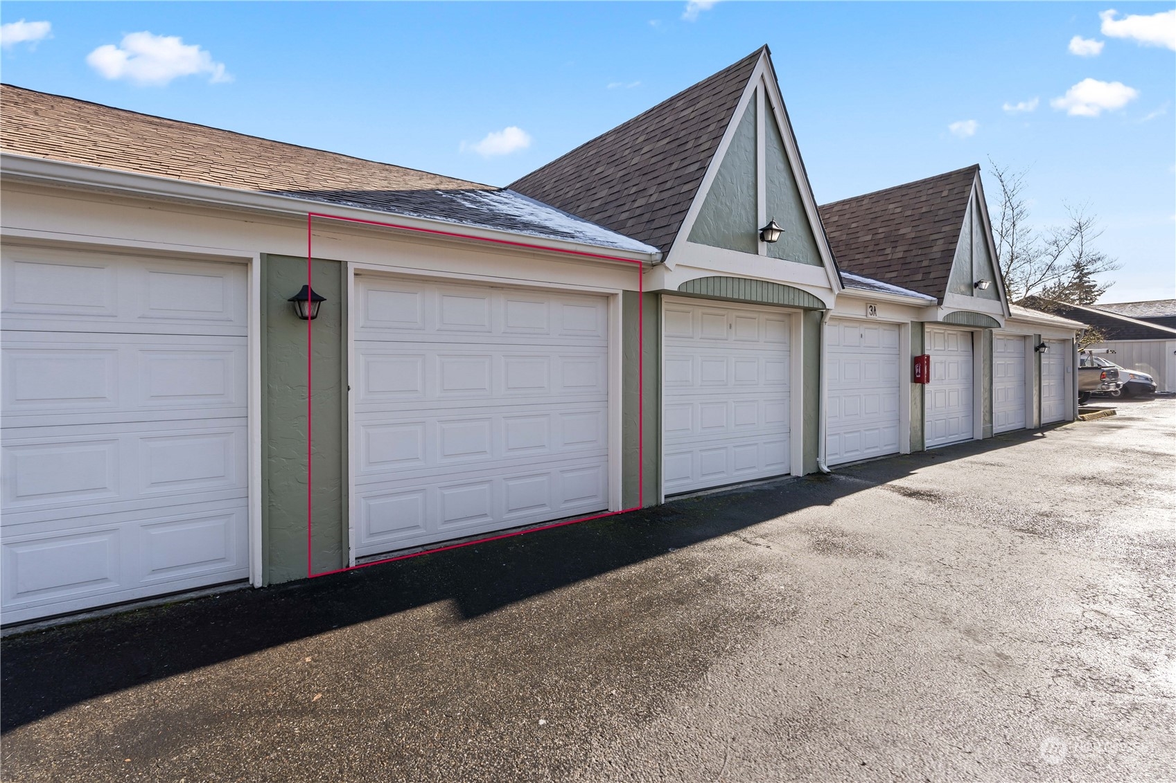 Red lines mark your garage just steps from your front door. Garage has build in storage shelves and above storage space.