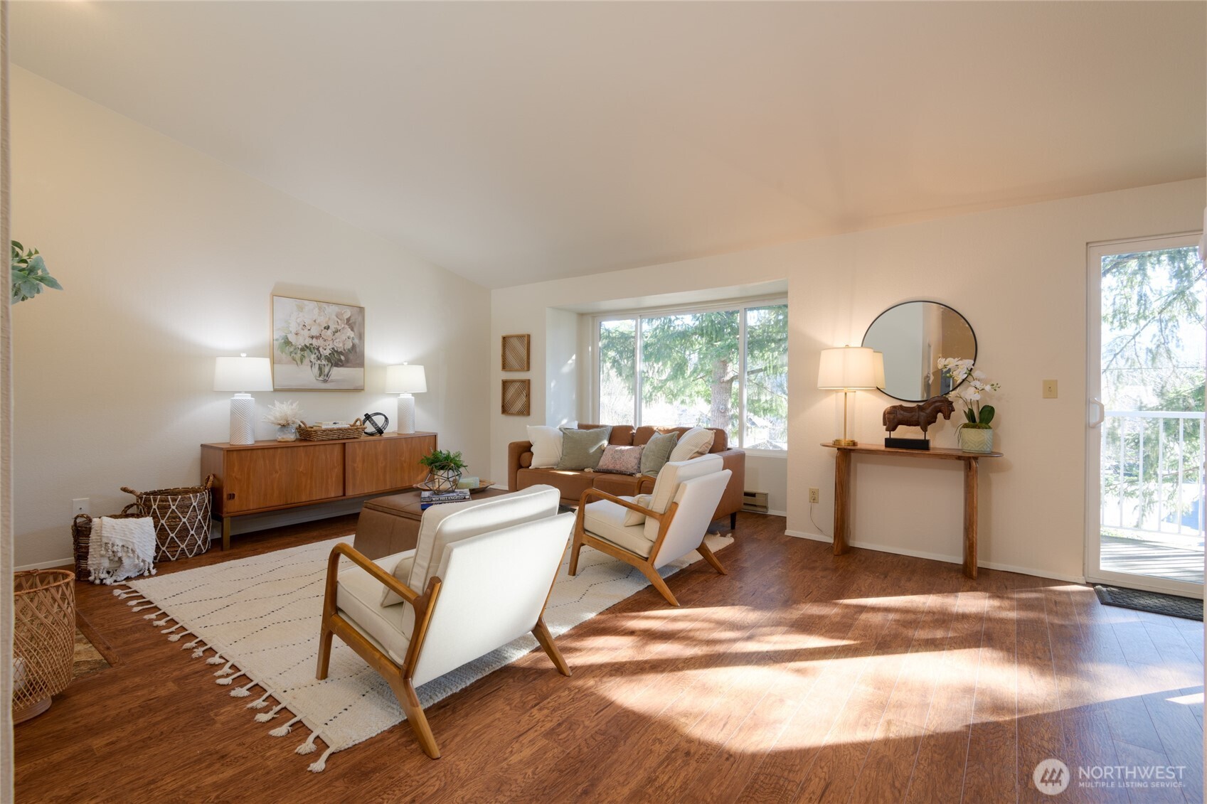 Lots of light enters the rooms from the large windows and slider on the East side of the home. Slider leads out to the private deck. Enjoy Cascade mountain views!