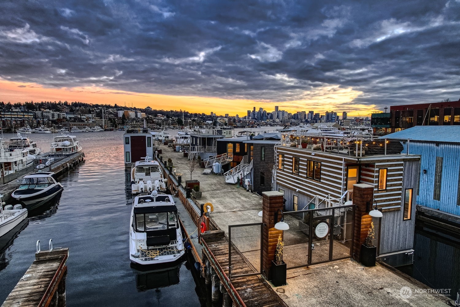 Lake Union Landing dock is approximately 10' wide, lined with trees and benches in the common areas. As you enter through the gated enter you find your little piece of heaven.