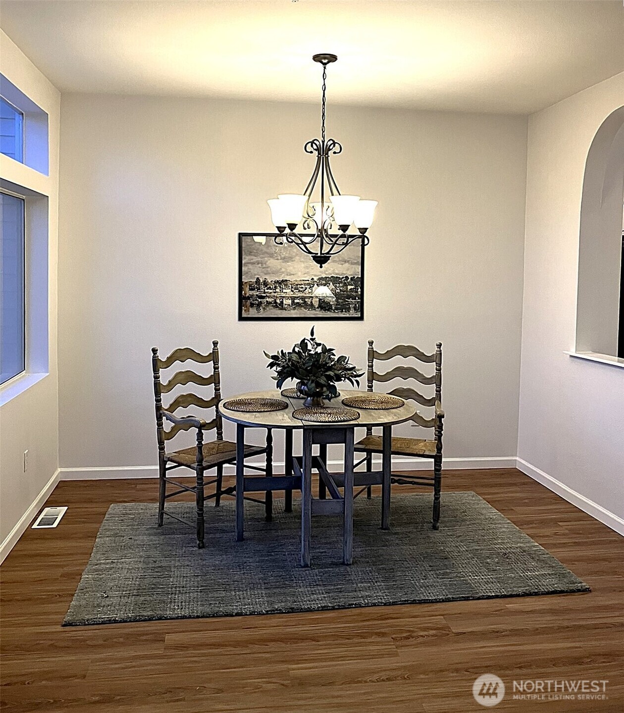 Dining area features a pass through from the kitchen.