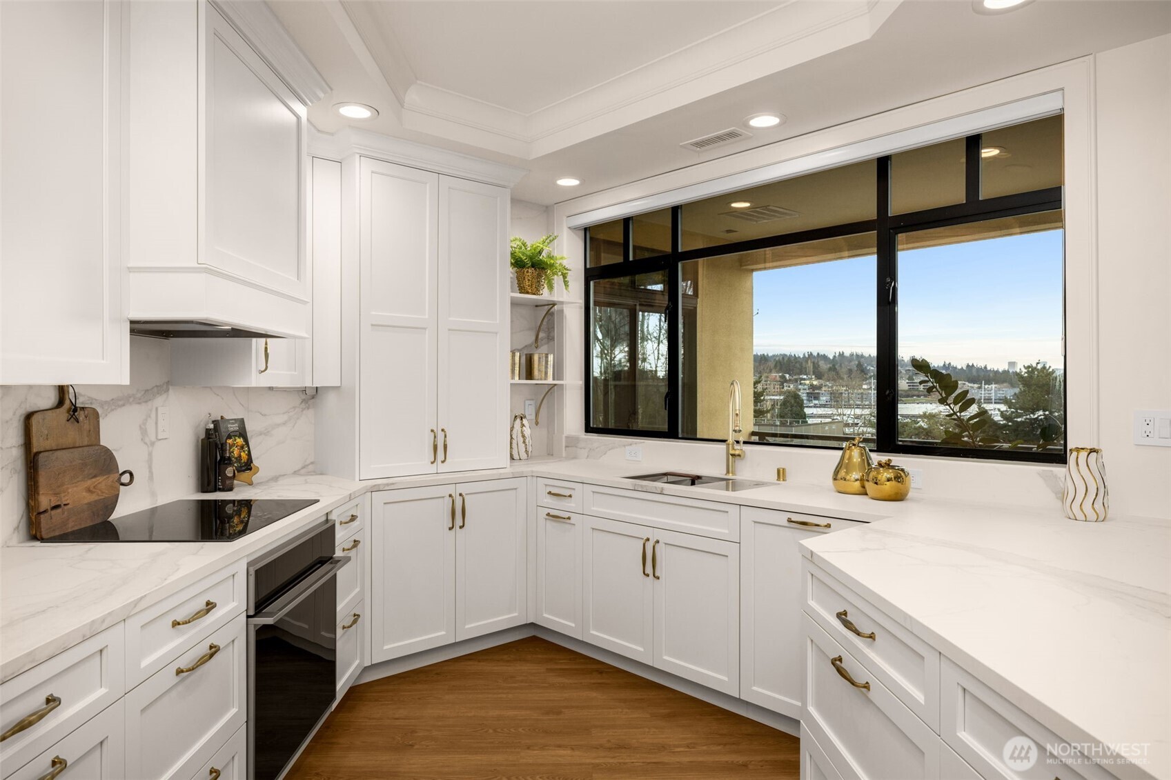 Enjoy the stunning view while cooking in this fully updated luxury kitchen.