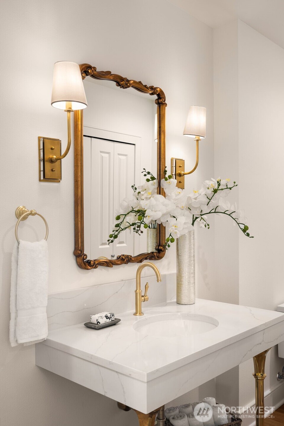 Your company will enjoy the guest bath and powder room