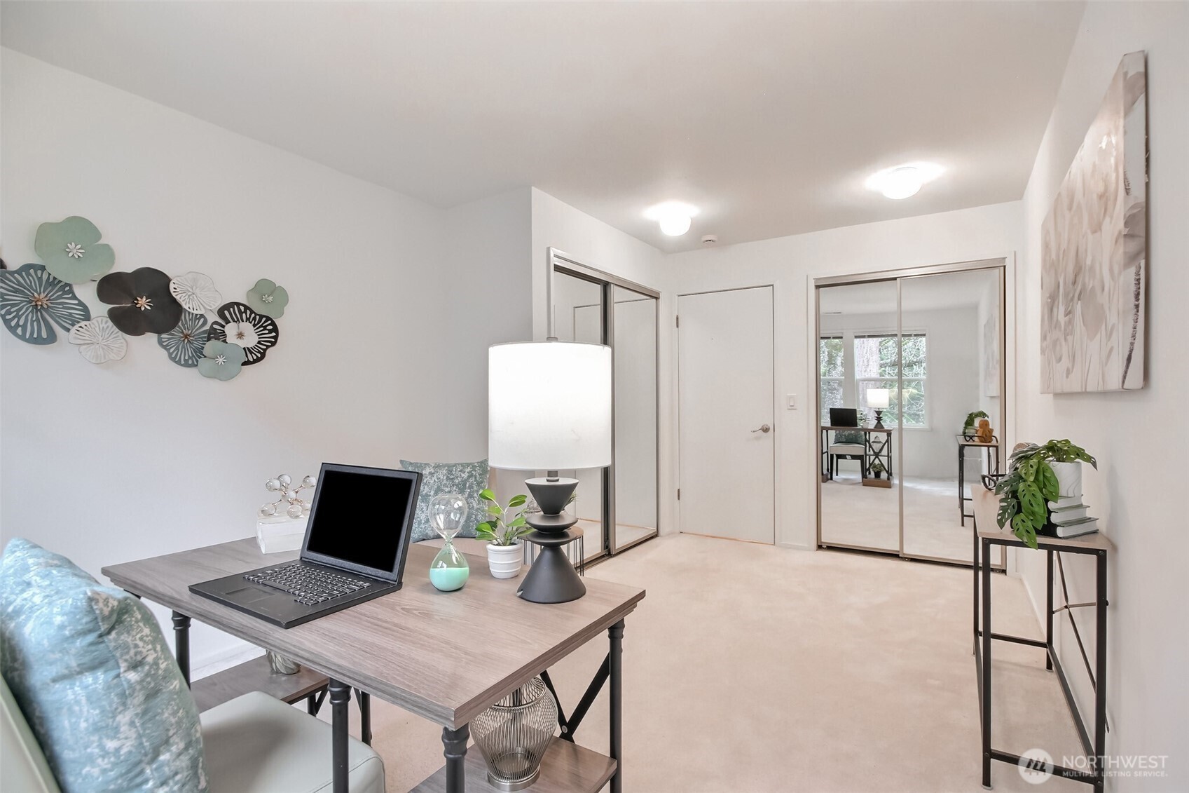 2nd bedroom with dual closets and views to nature.