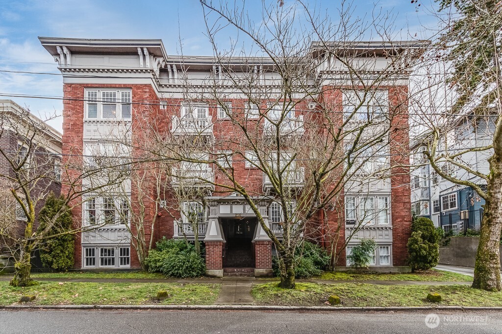 The Rosemont was built in 1917 when the Craftsman style was dominant and old growth timber wasn't cost prohibitive. Note the wooden detailing throughout and the thick corbels that anchor the roof overhang.