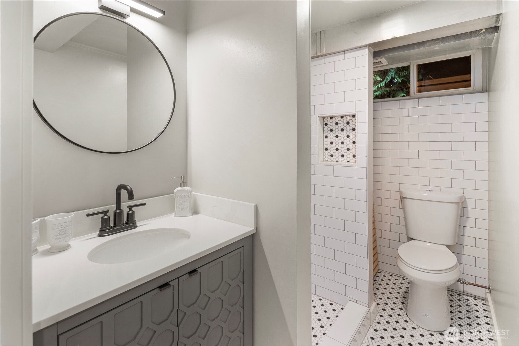 This is the recently remodeled lower-level bathroom, with shower.