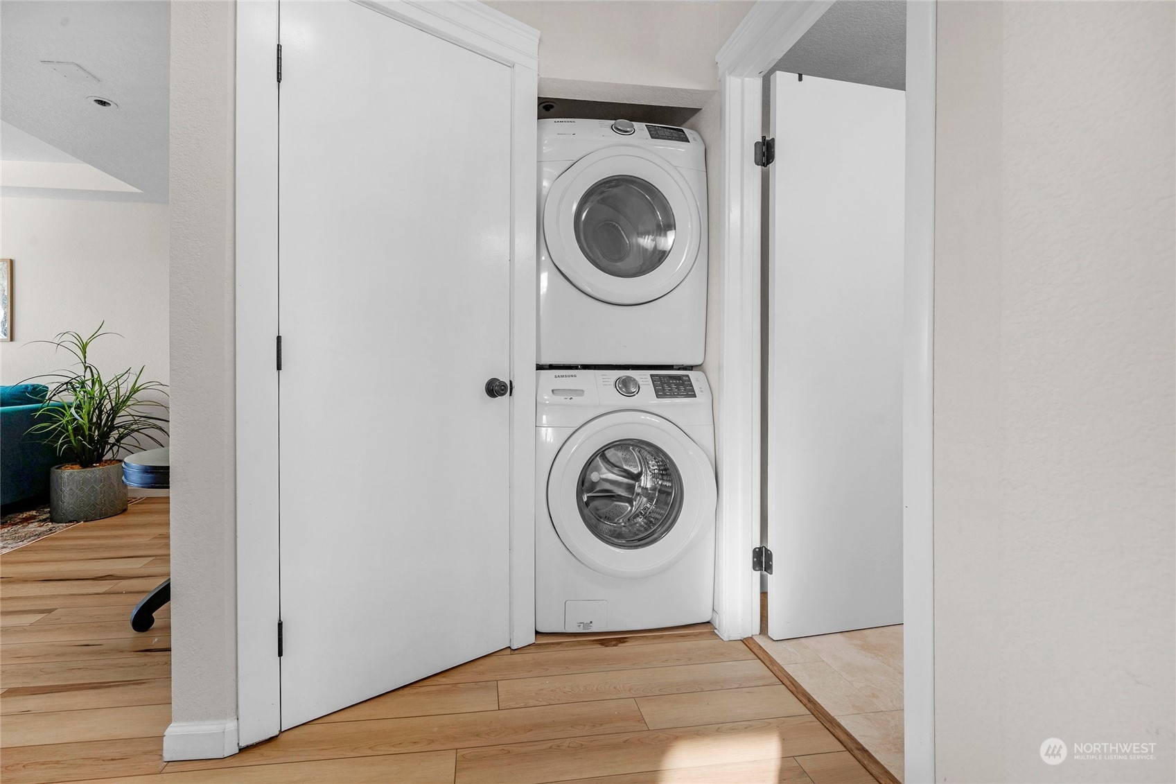 Full size stackable washer/dryer remain with home-adjacent large closet