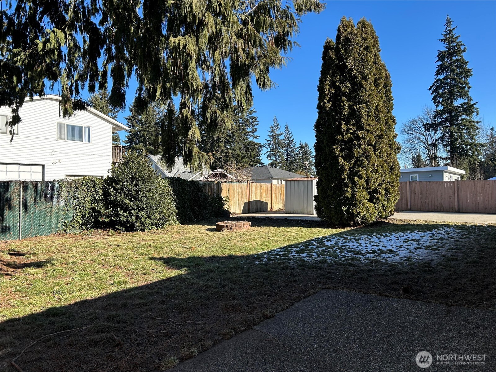 Huge yard with a firepit