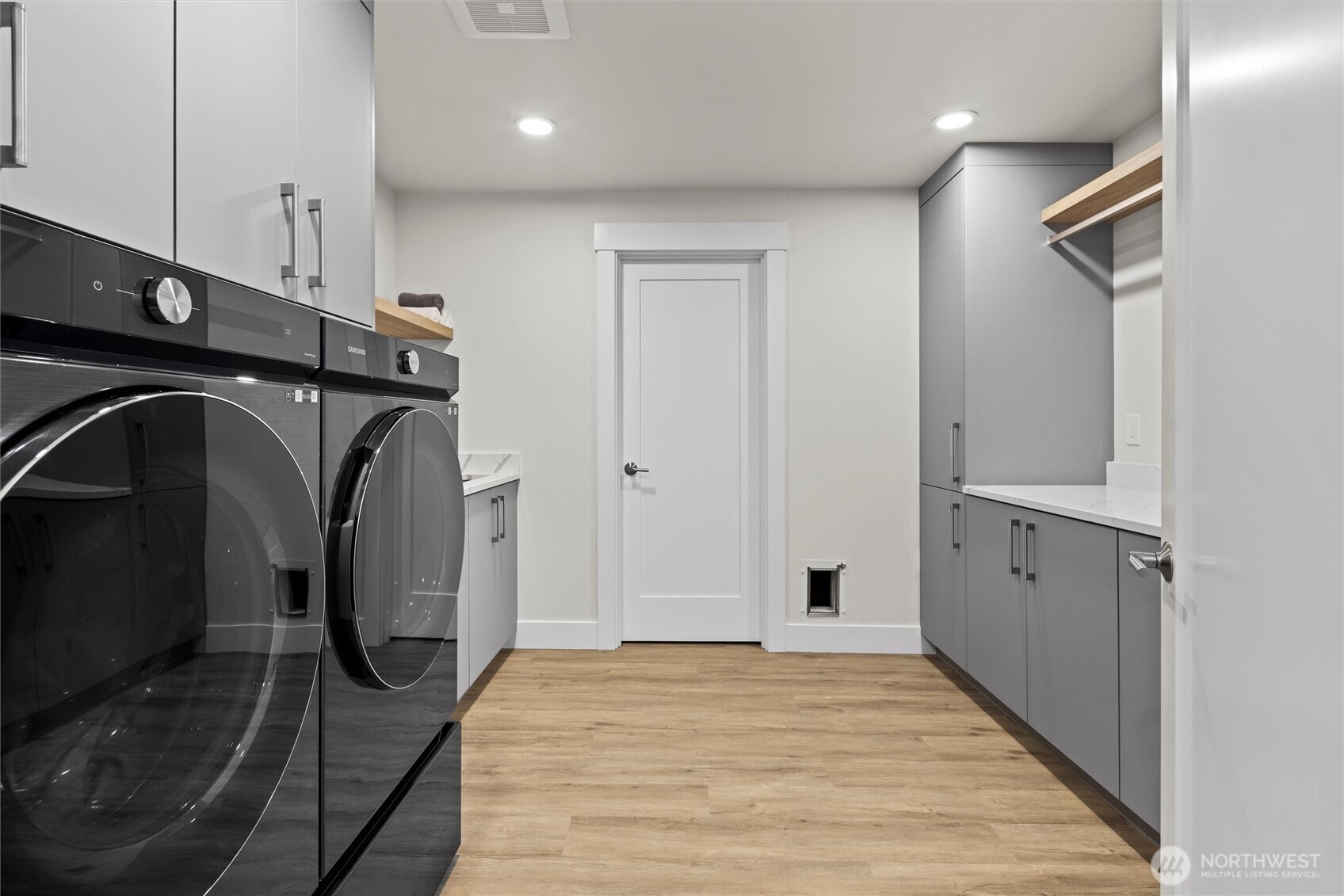 Utility room with storage and work space