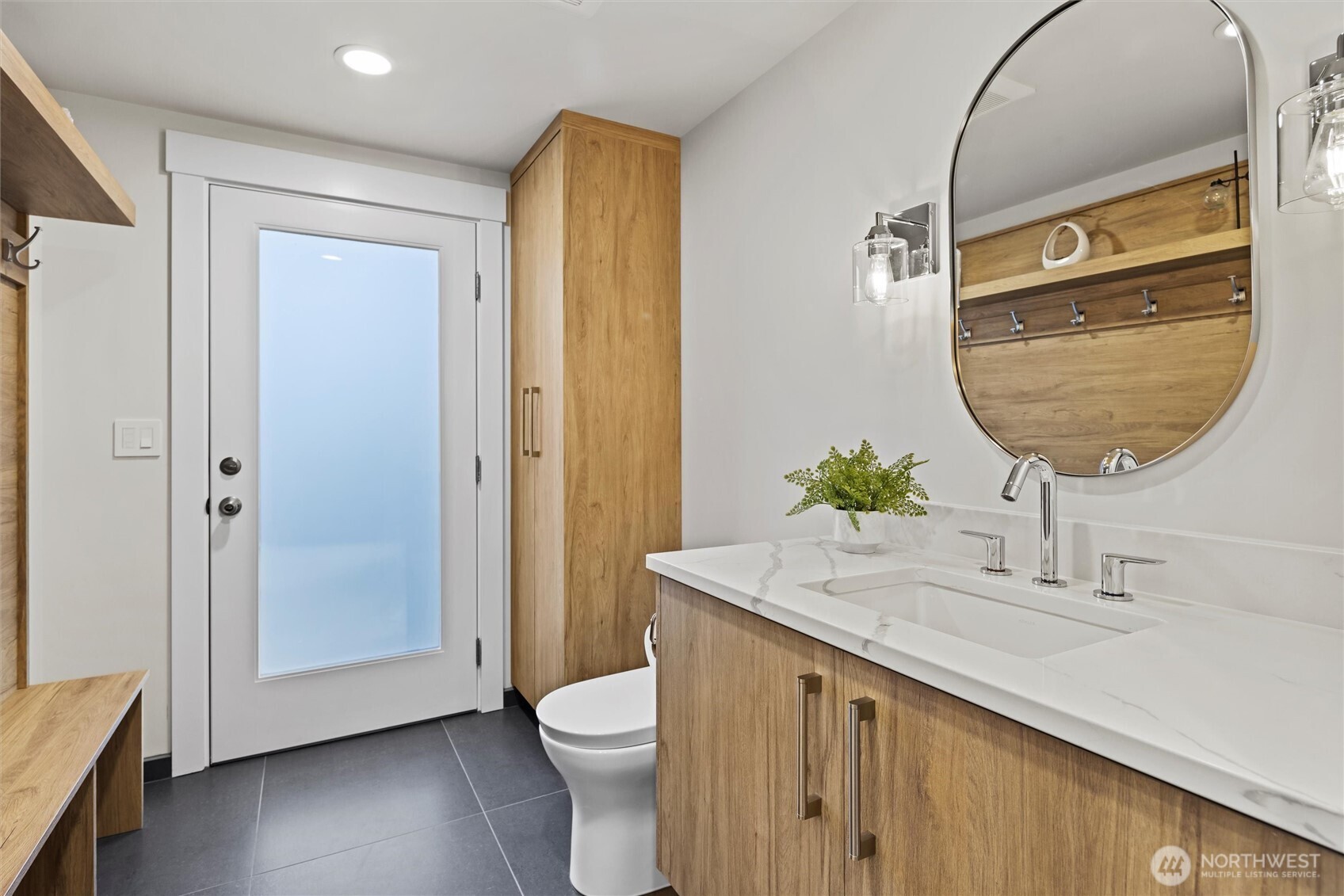 Lower-level half bath with storage