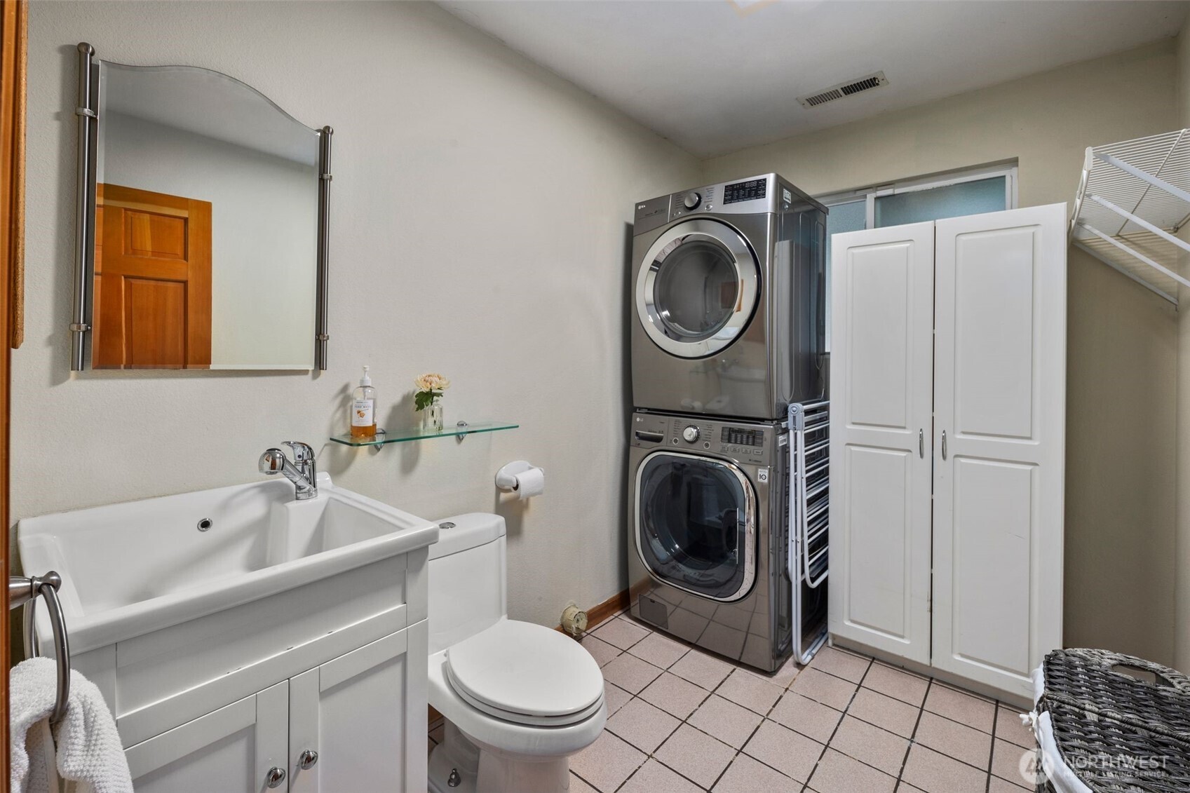 Downstairs laundry room, with a half bath for your convienence!